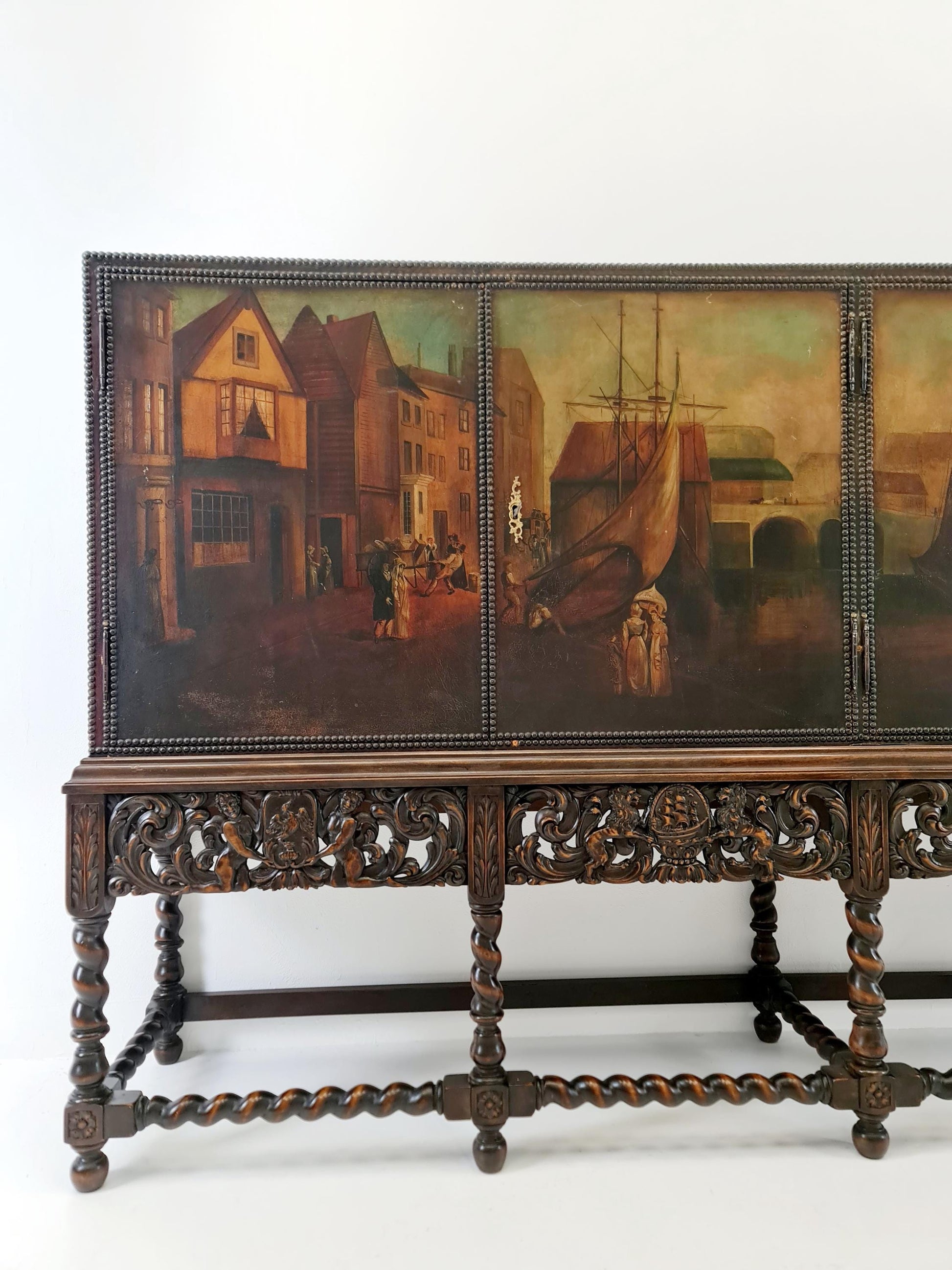 Extraordinary 1920s Ornate Carved Wood Buffet Cabinet with Hand-Painted Leather