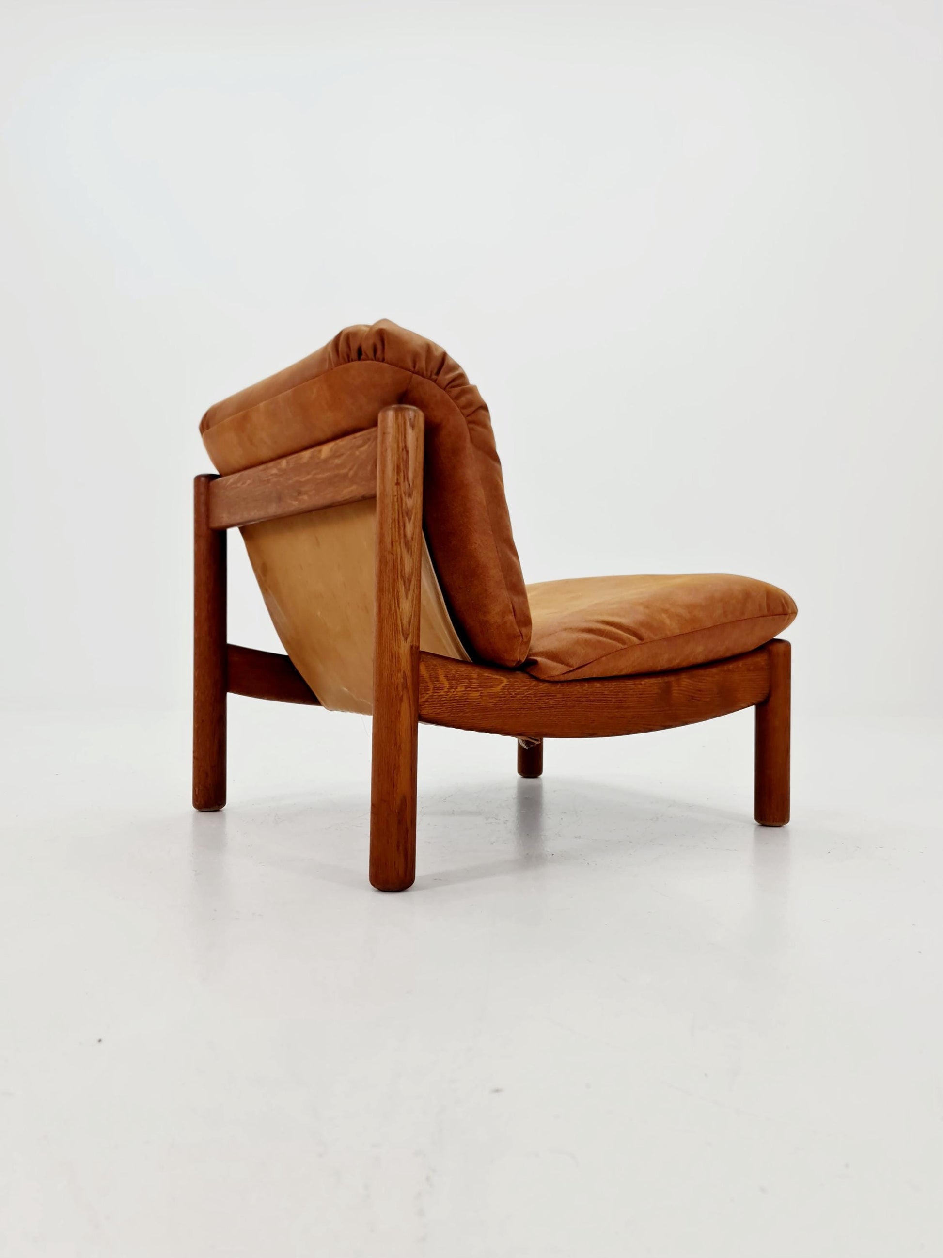 mid century loungechair in leather and wood By Carl Straub Germany , 1960s