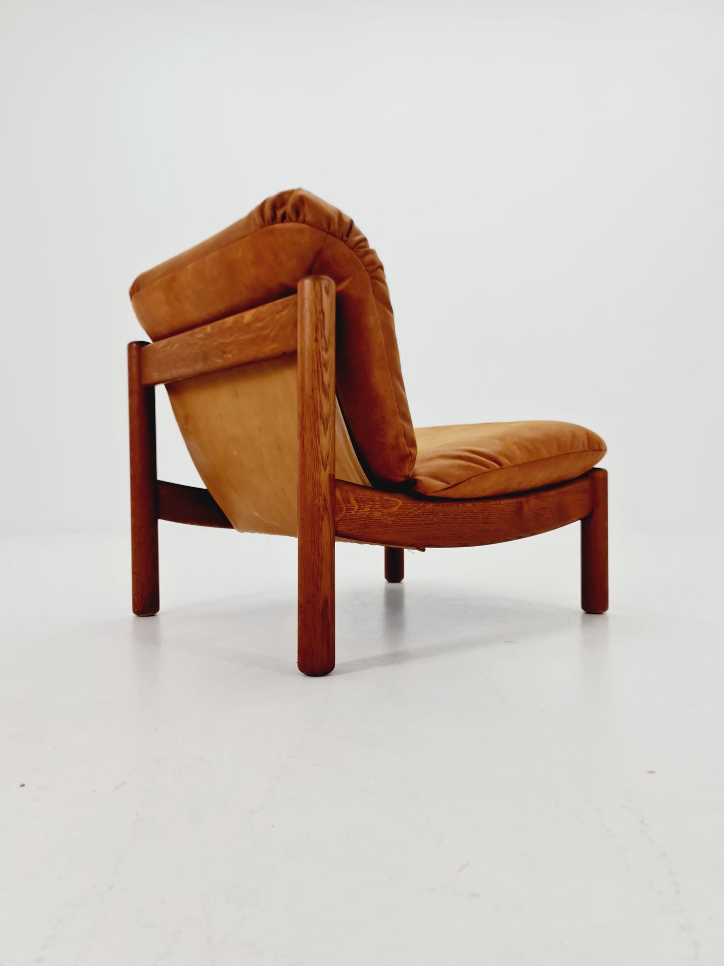 mid century loungechair in leather and wood By Carl Straub Germany , 1960s