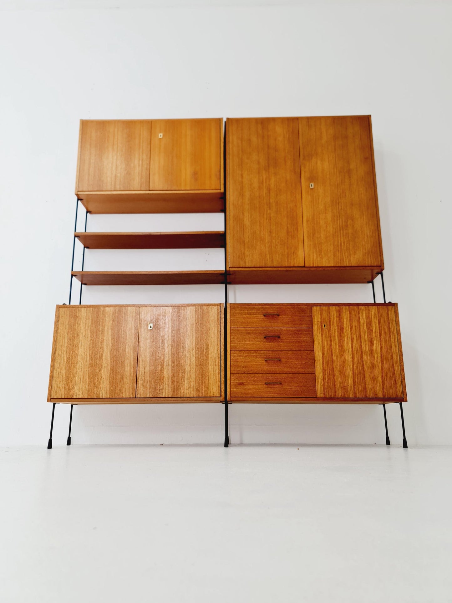Mid century teak wall shelving unit by Hilker for Omnia, Germany, 1960s