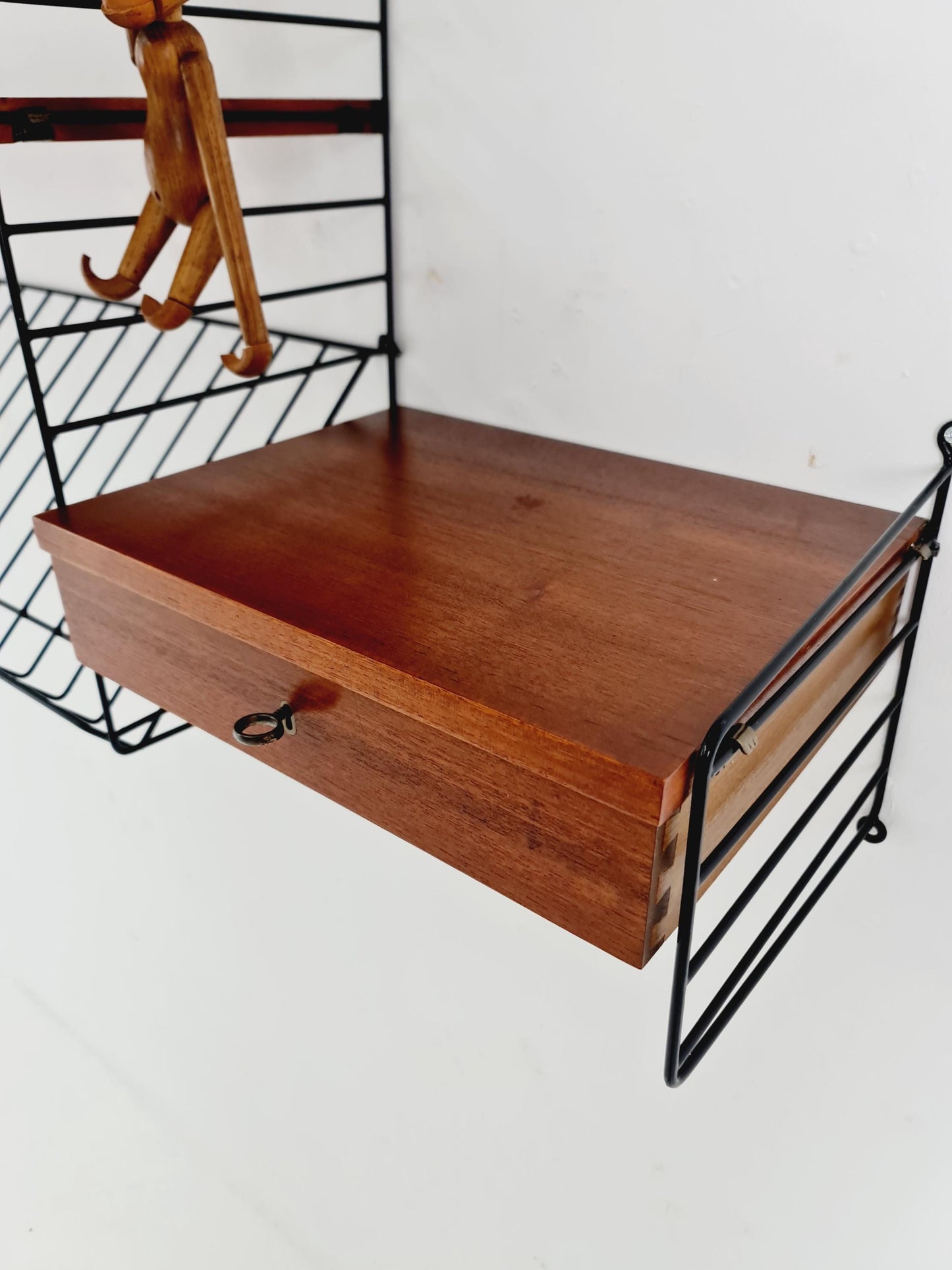 Original MCM Teak shelving system - consists of black lacquered metal ladders, from string Stockholm 1960s