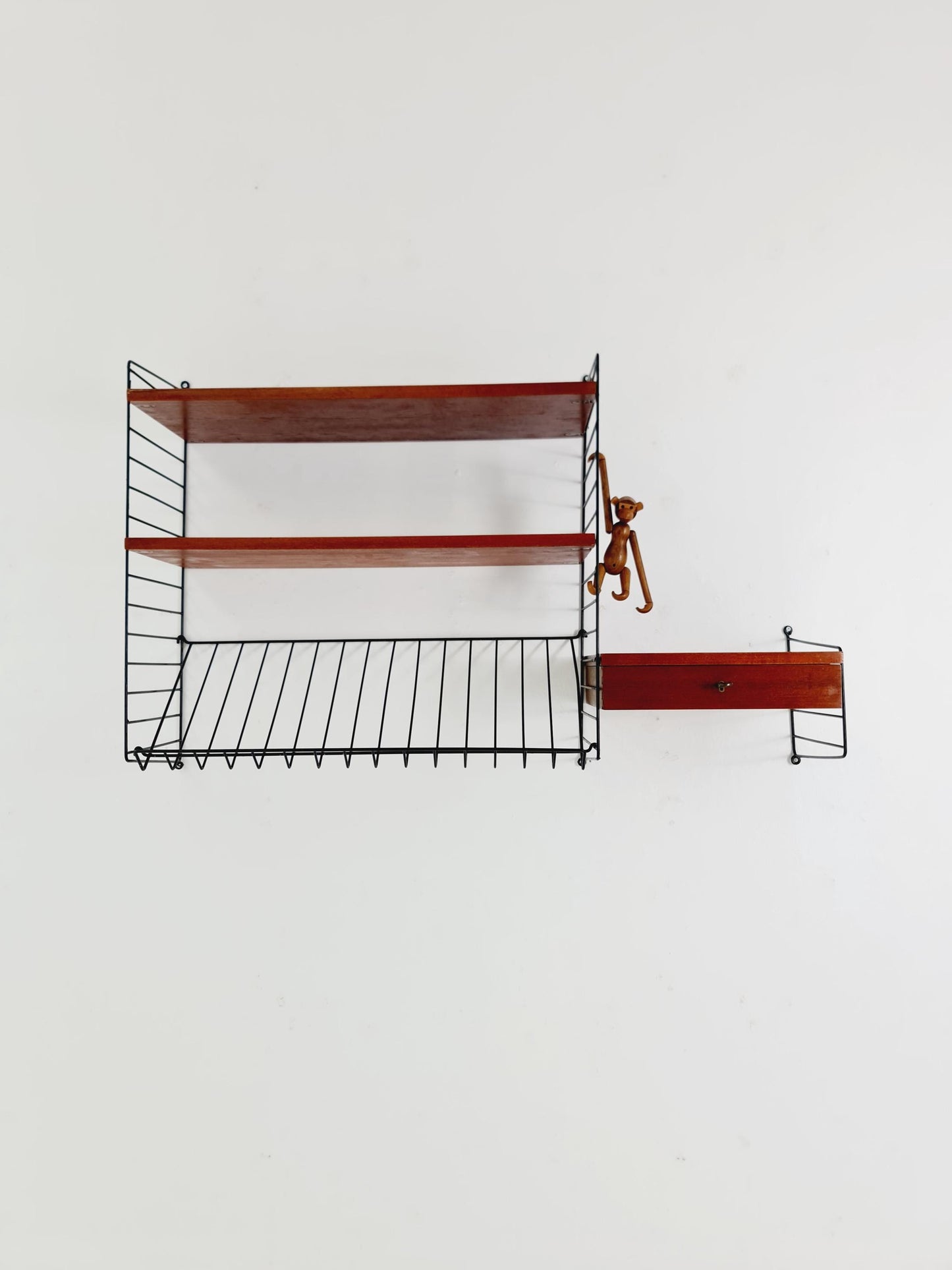 Original MCM Teak shelving system - consists of black lacquered metal ladders, from string Stockholm 1960s