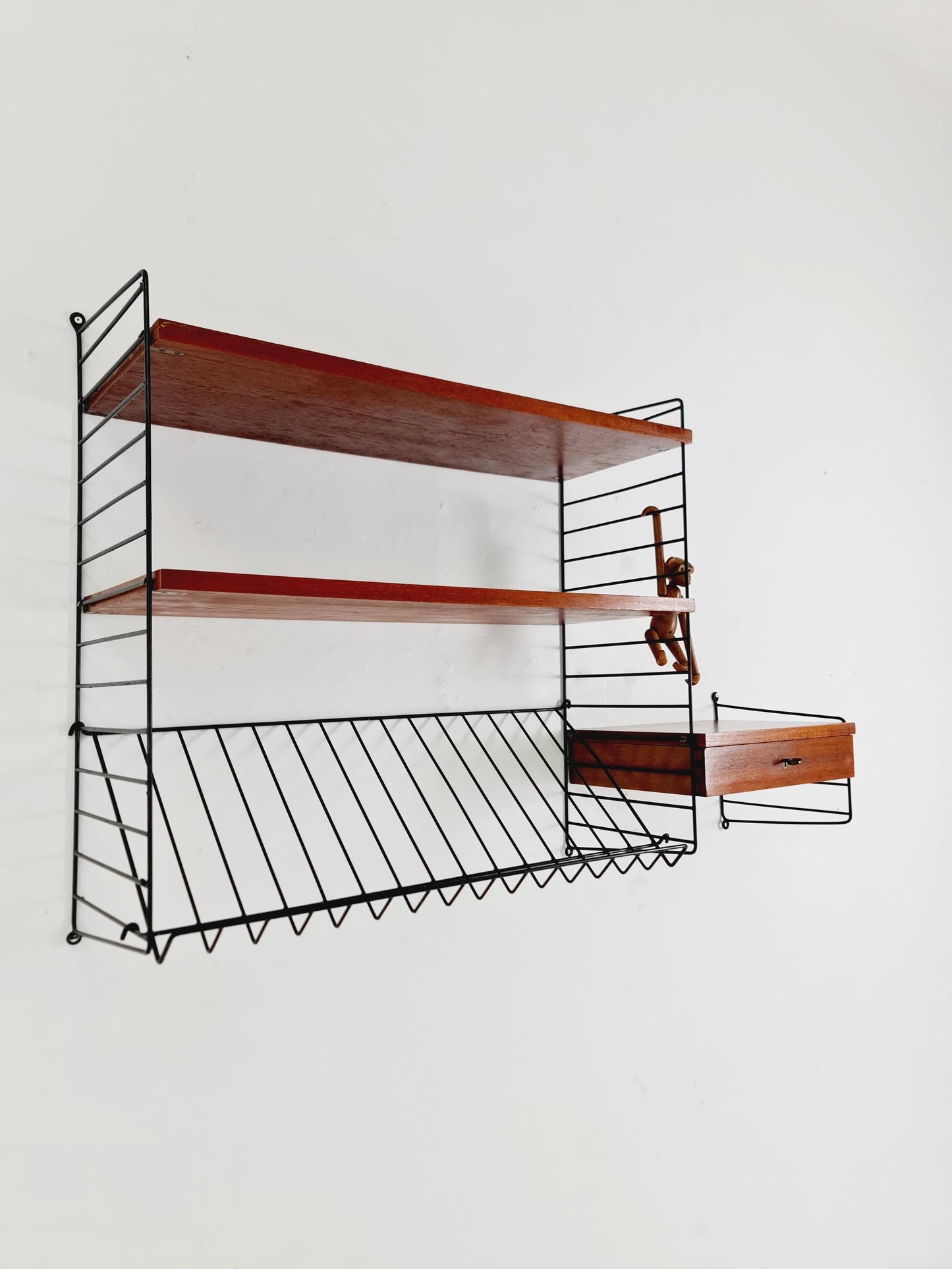 Original MCM Teak shelving system - consists of black lacquered metal ladders, from string Stockholm 1960s
