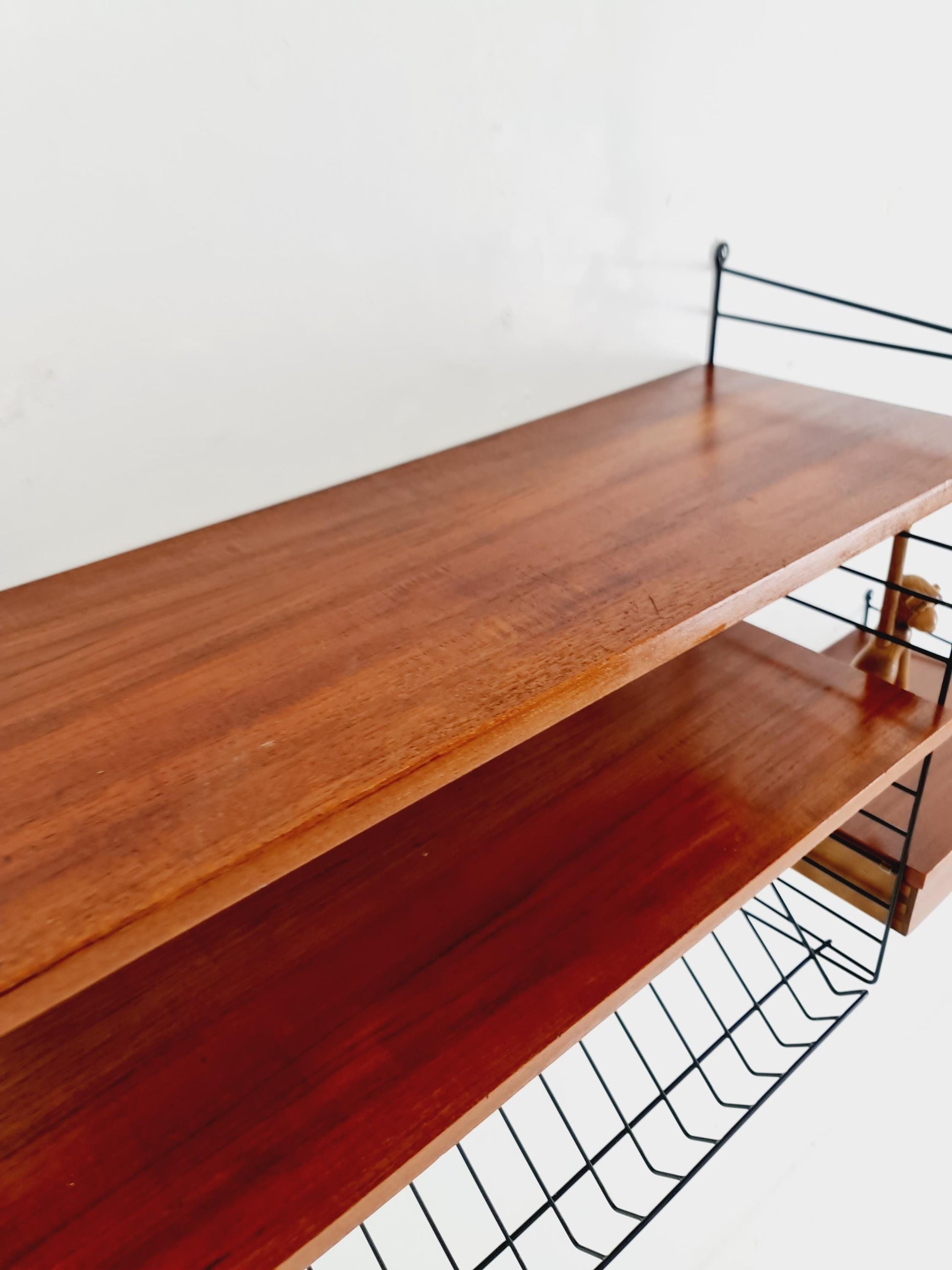 Original MCM Teak shelving system - consists of black lacquered metal ladders, from string Stockholm 1960s