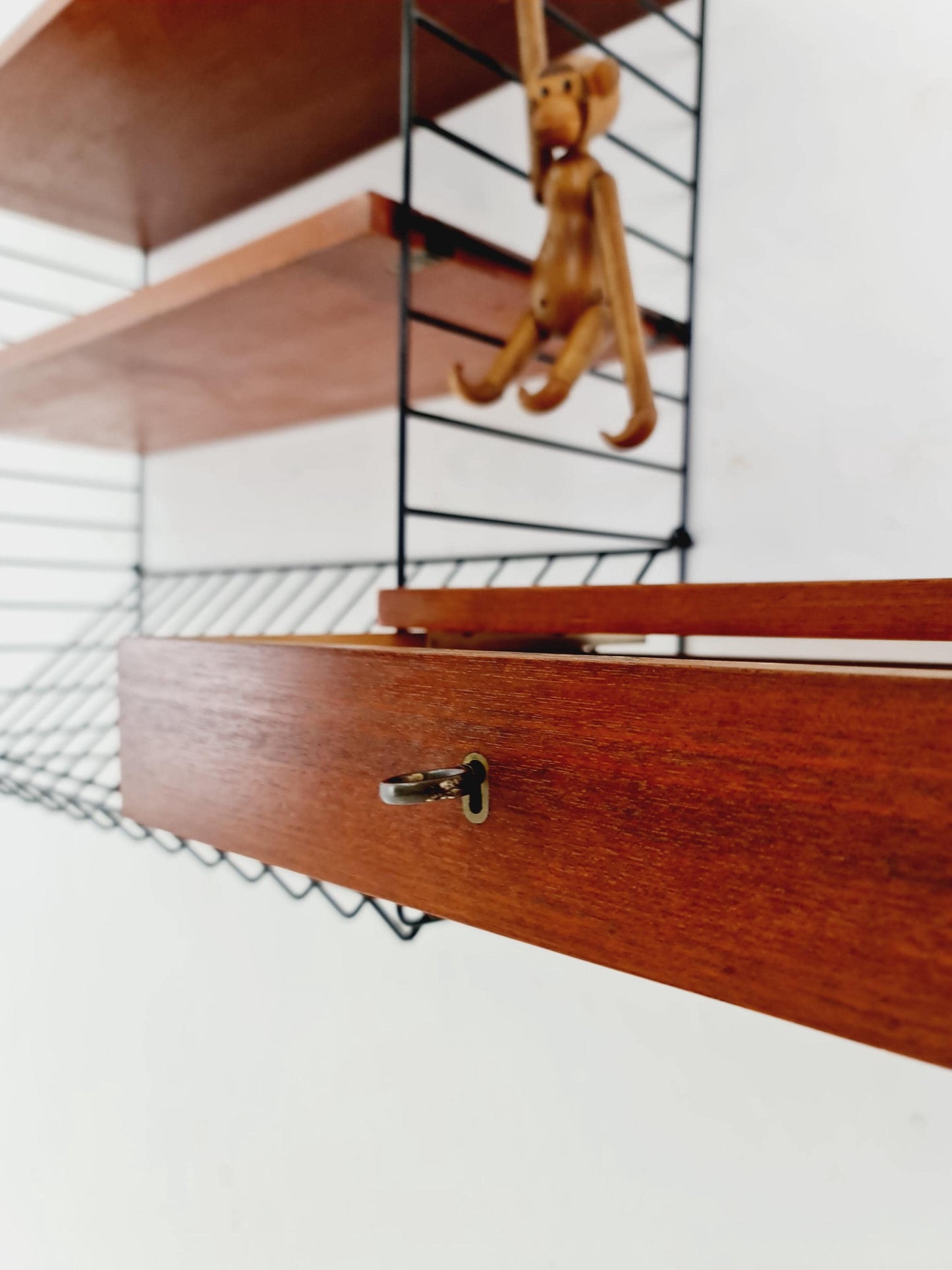 Original MCM Teak shelving system - consists of black lacquered metal ladders, from string Stockholm 1960s