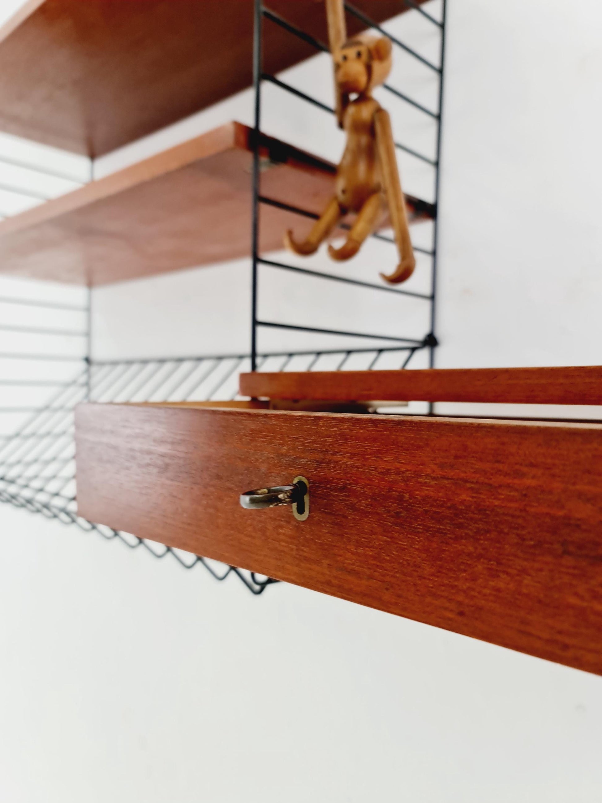 Original MCM Teak shelving system - consists of black lacquered metal ladders, from string Stockholm 1960s
