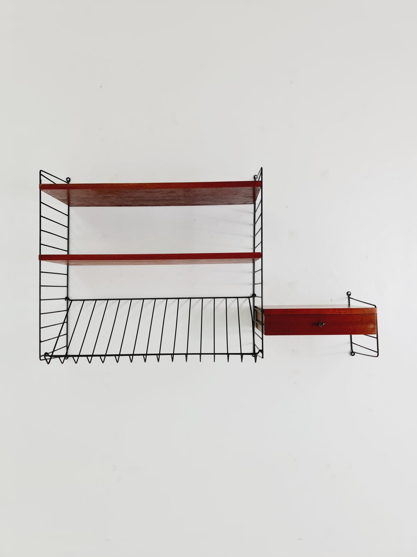 Original MCM Teak shelving system - consists of black lacquered metal ladders, from string Stockholm 1960s