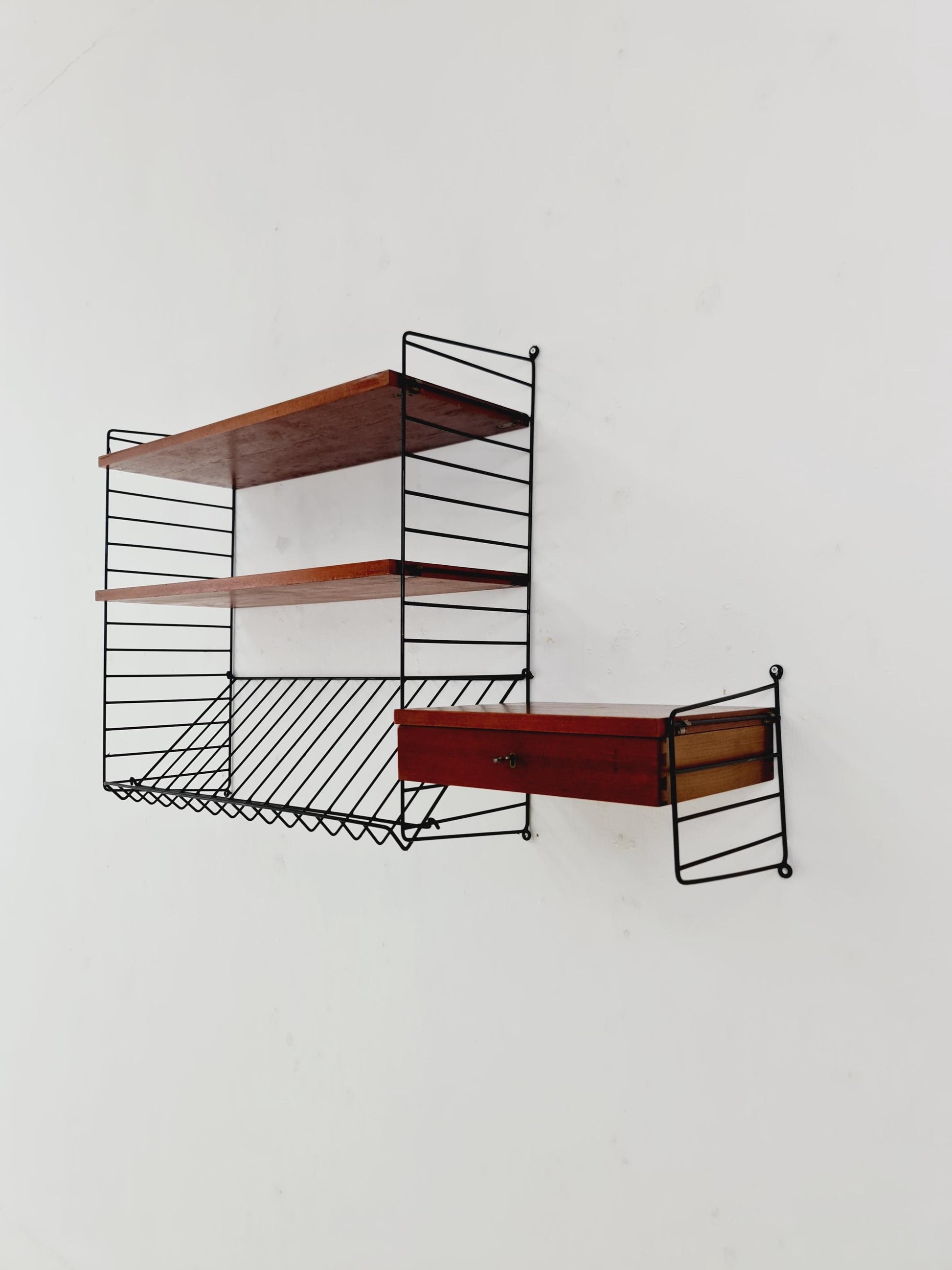 Original MCM Teak shelving system - consists of black lacquered metal ladders, from string Stockholm 1960s