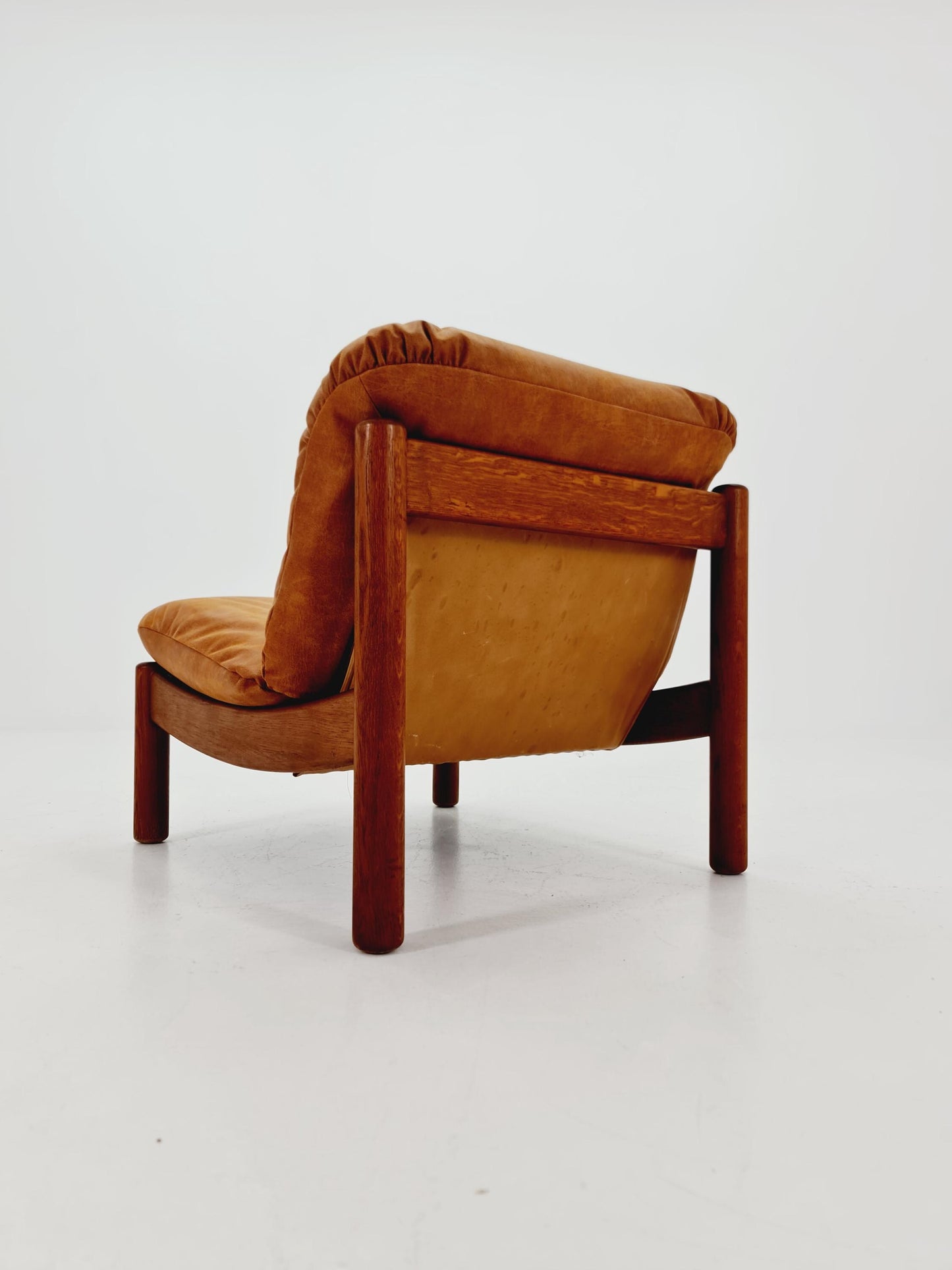 mid century loungechair in leather and wood By Carl Straub Germany , 1960s