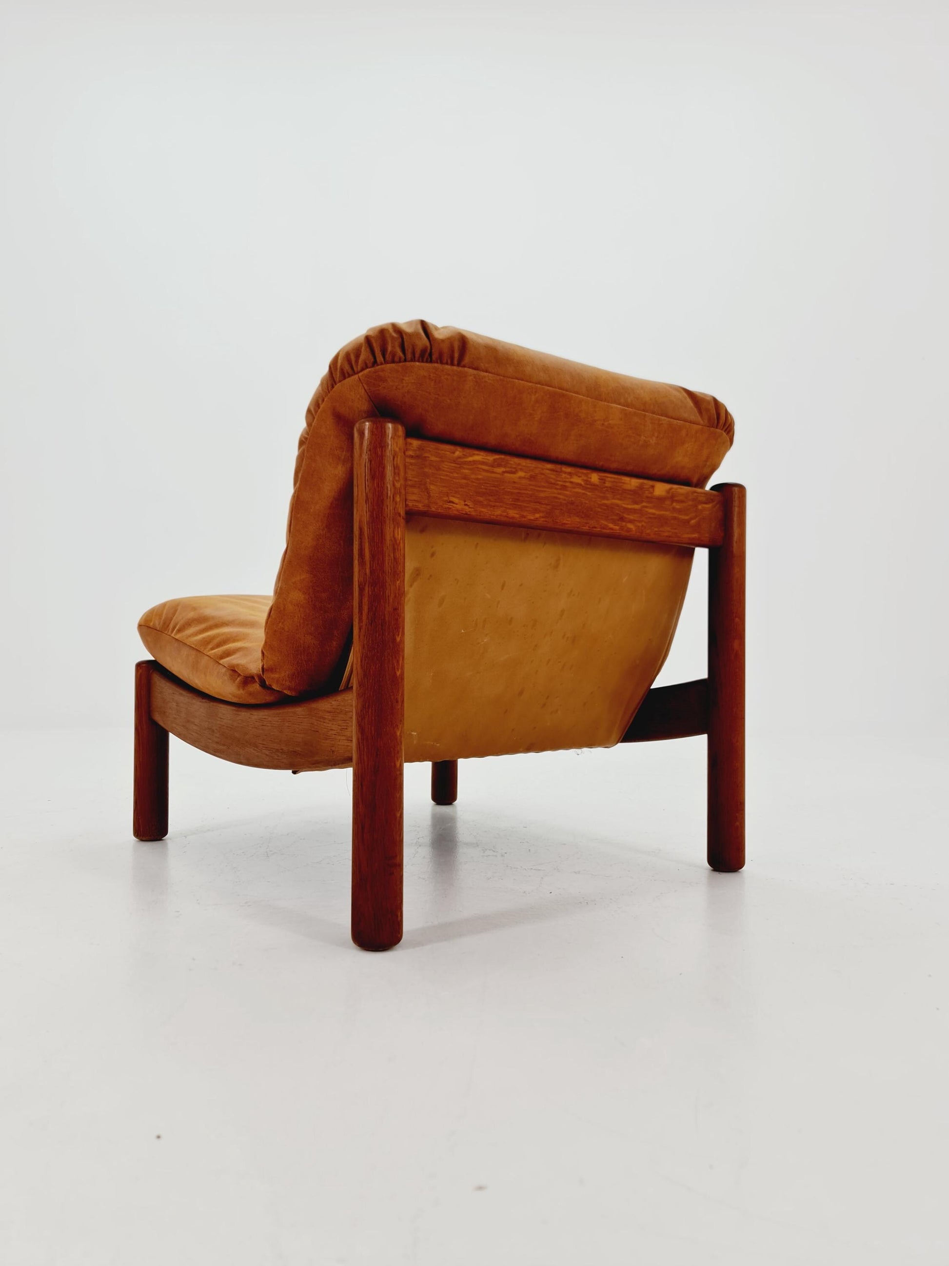 mid century loungechair in leather and wood By Carl Straub Germany , 1960s