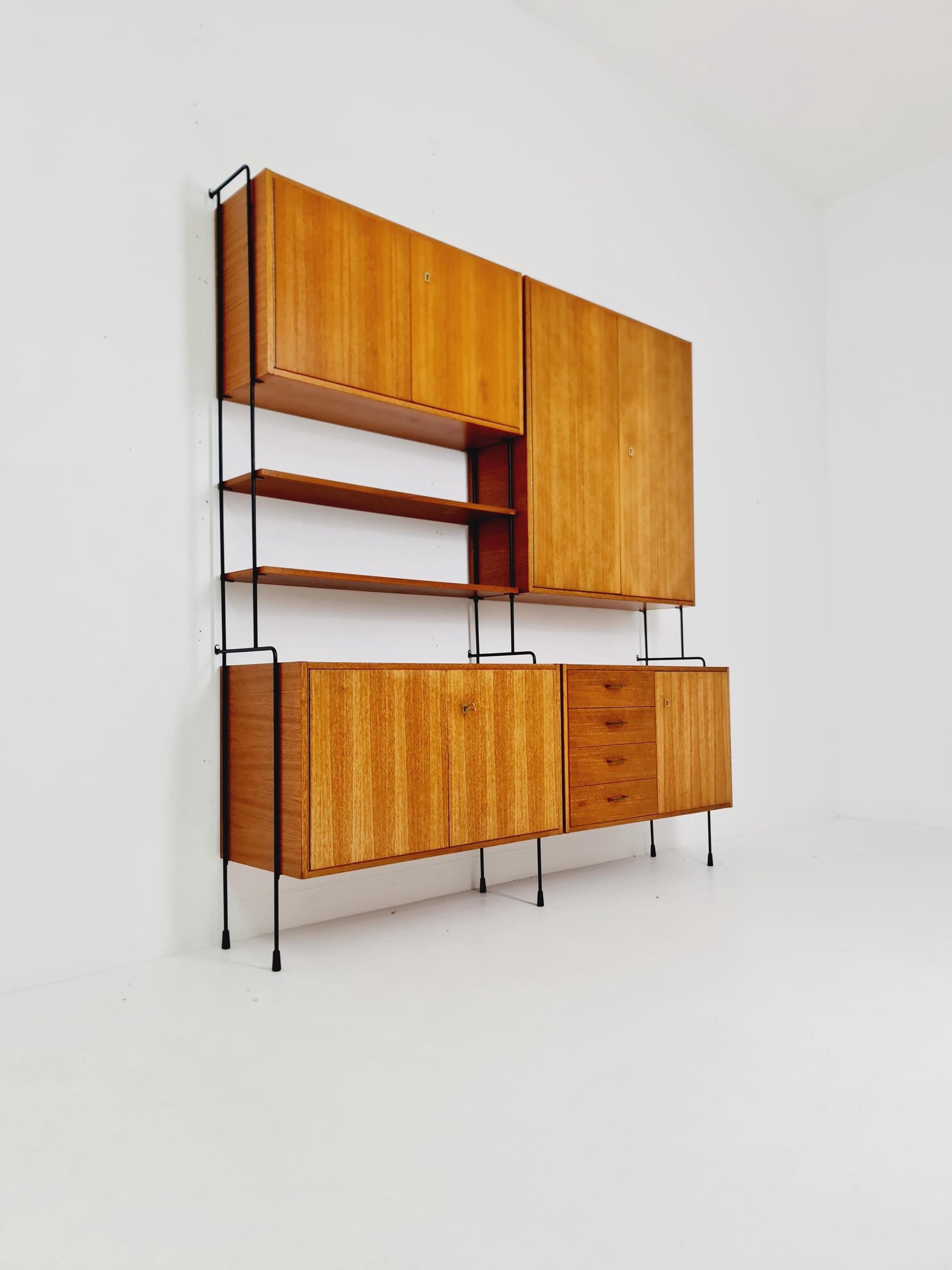 Mid century teak wall shelving unit by Hilker for Omnia, Germany, 1960s