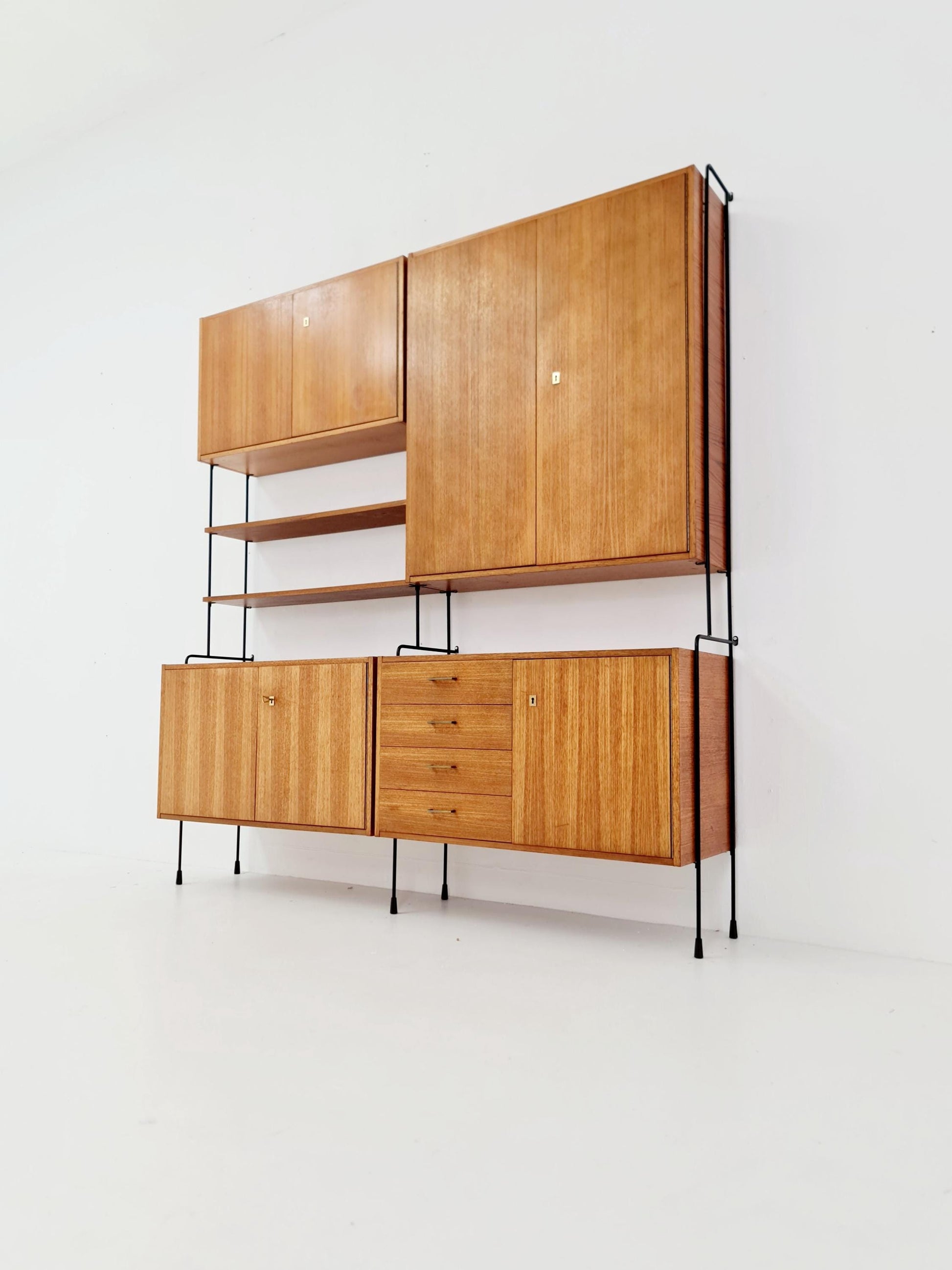 Mid century teak wall shelving unit by Hilker for Omnia, Germany, 1960s