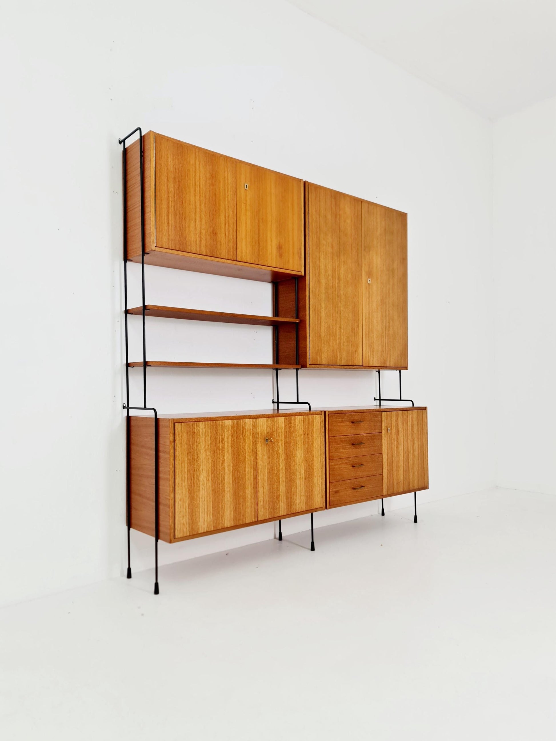 Mid century teak wall shelving unit by Hilker for Omnia, Germany, 1960s