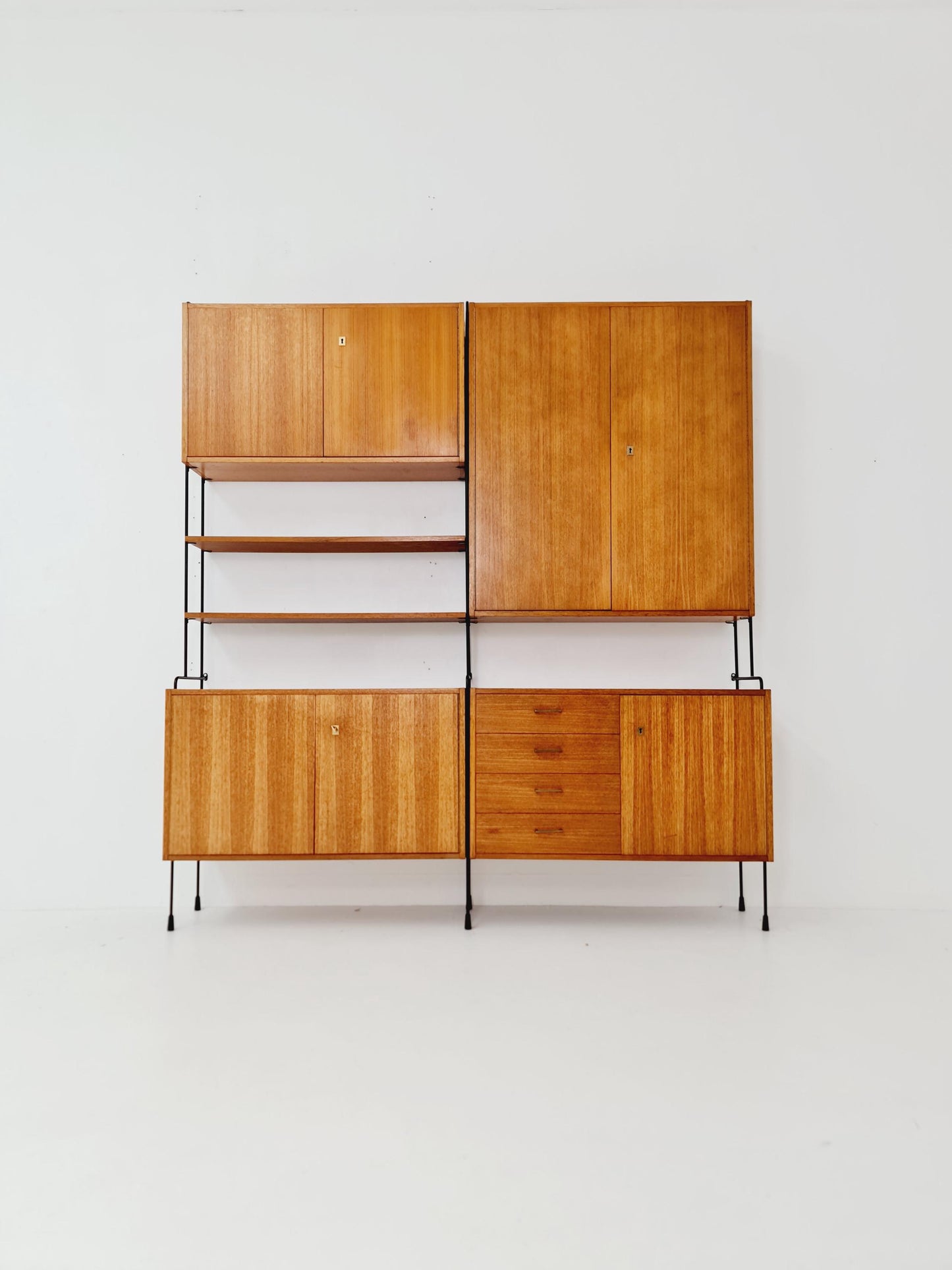 Mid century teak wall shelving unit by Hilker for Omnia, Germany, 1960s