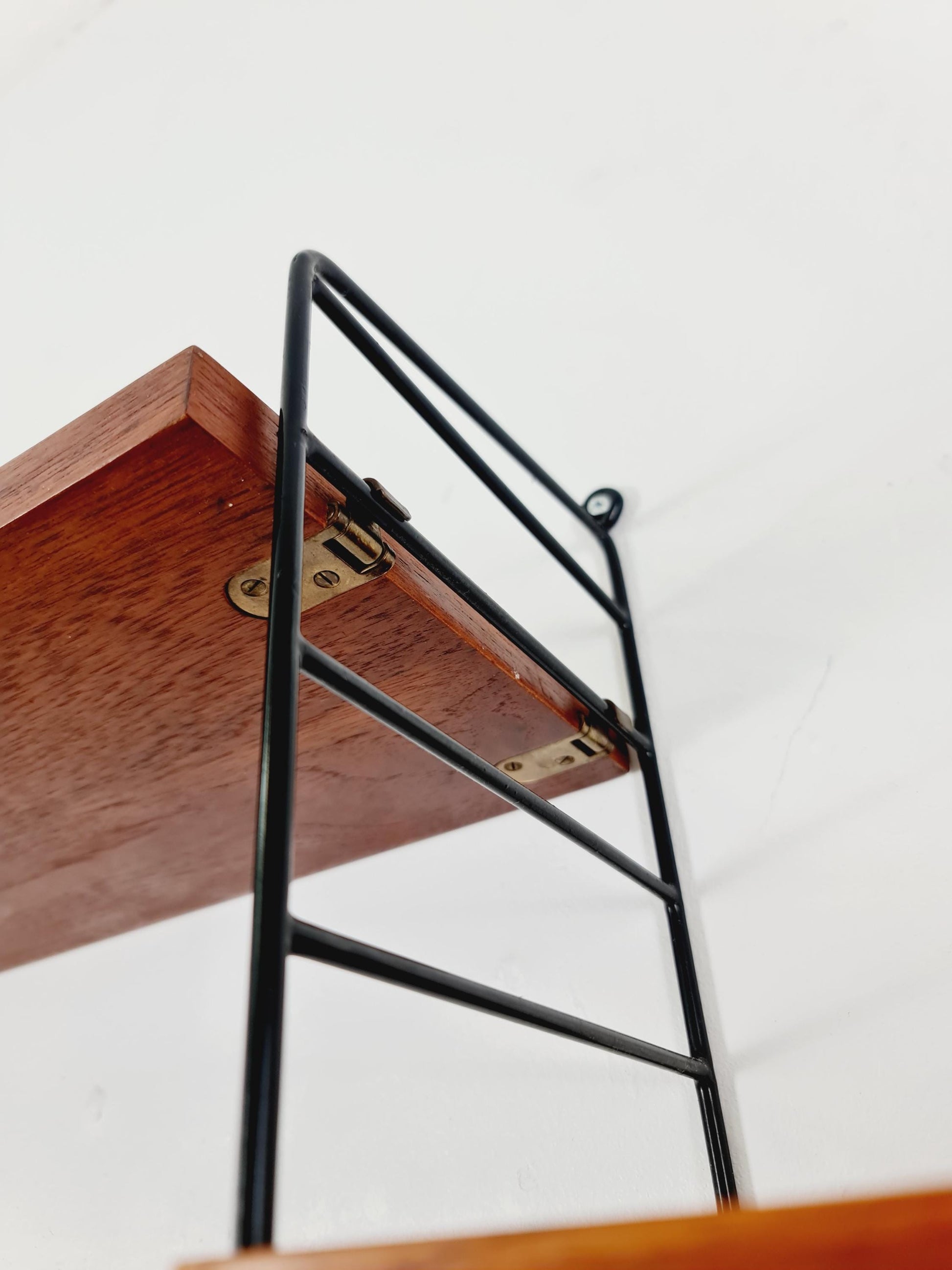 Original MCM Teak shelving system - consists of black lacquered metal ladders, from string Stockholm 1960s