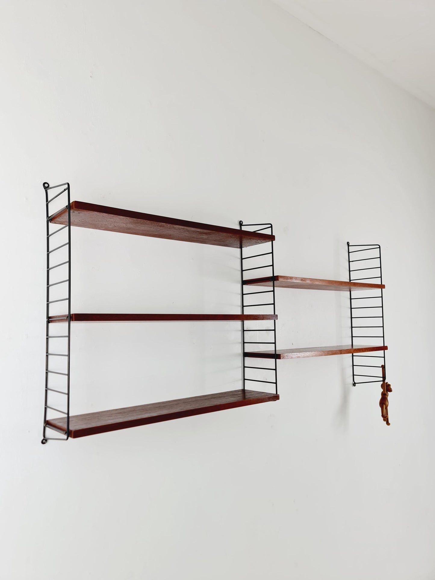 Original MCM Teak shelving system - consists of black lacquered metal ladders, from string Stockholm 1960s