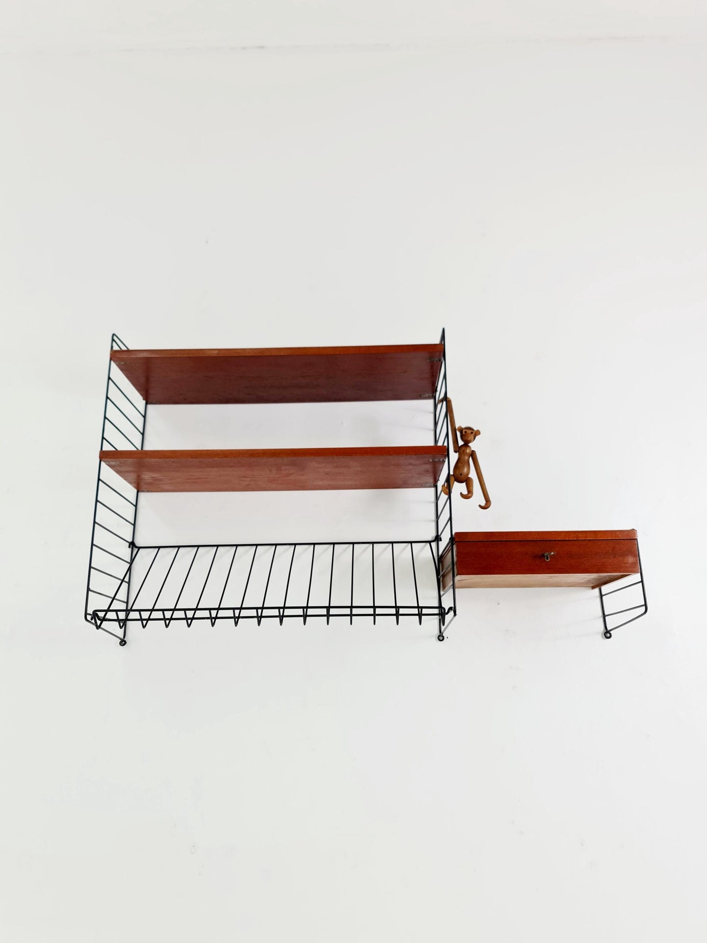 Original MCM Teak shelving system - consists of black lacquered metal ladders, from string Stockholm 1960s