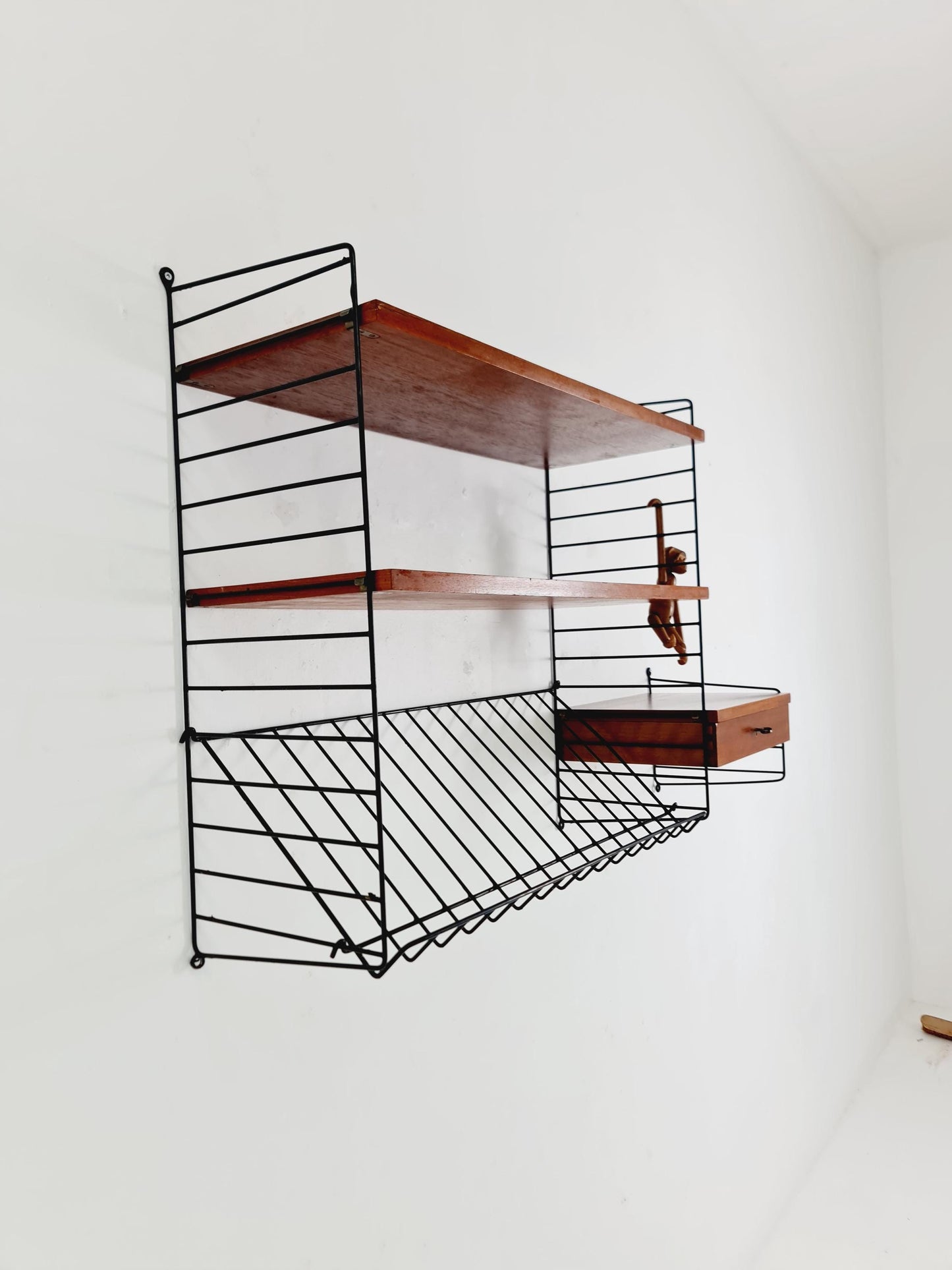 Original MCM Teak shelving system - consists of black lacquered metal ladders, from string Stockholm 1960s
