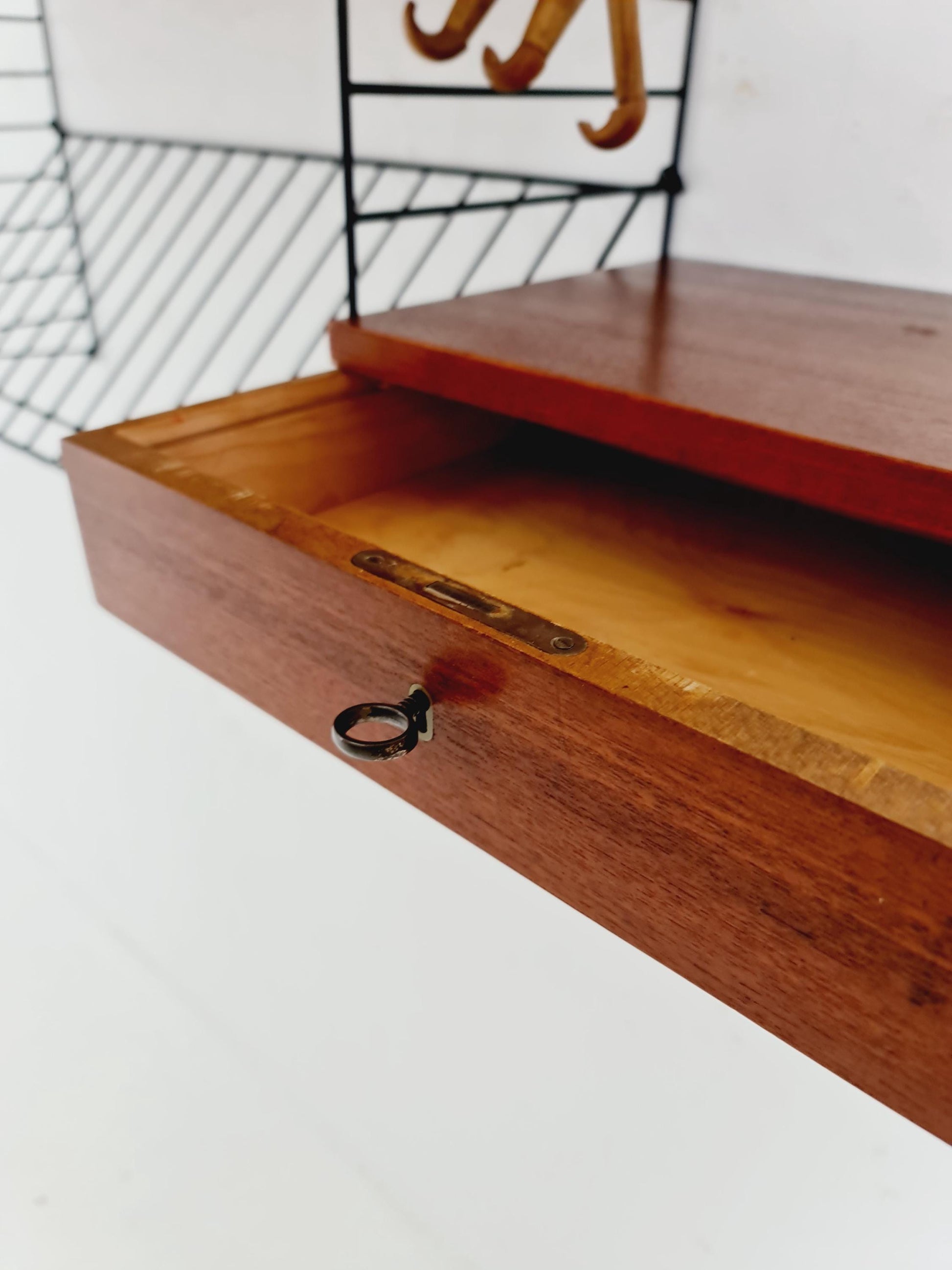 Original MCM Teak shelving system - consists of black lacquered metal ladders, from string Stockholm 1960s