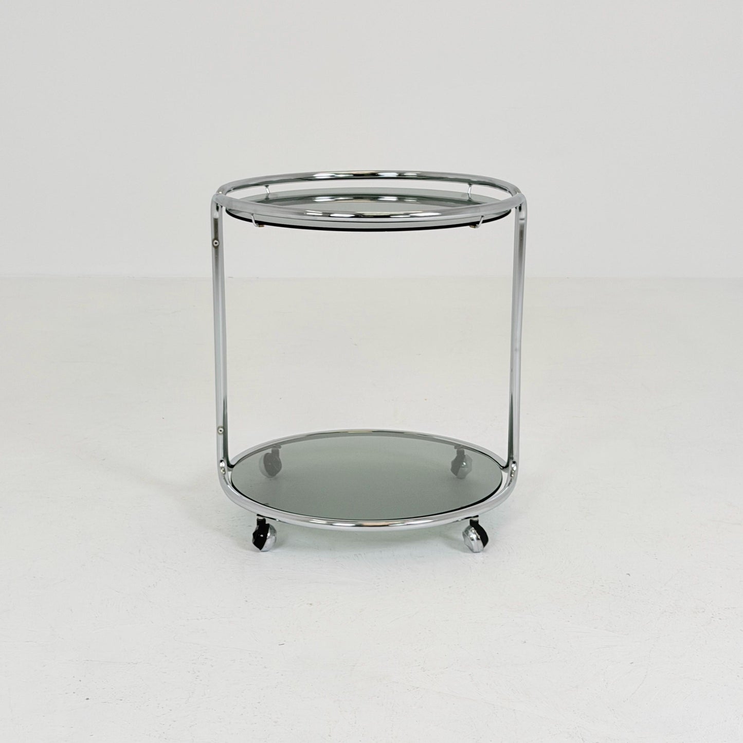 Mid century Chrome bar cart/serving trolley. Smoked glass Bauhaus Italy 1980s