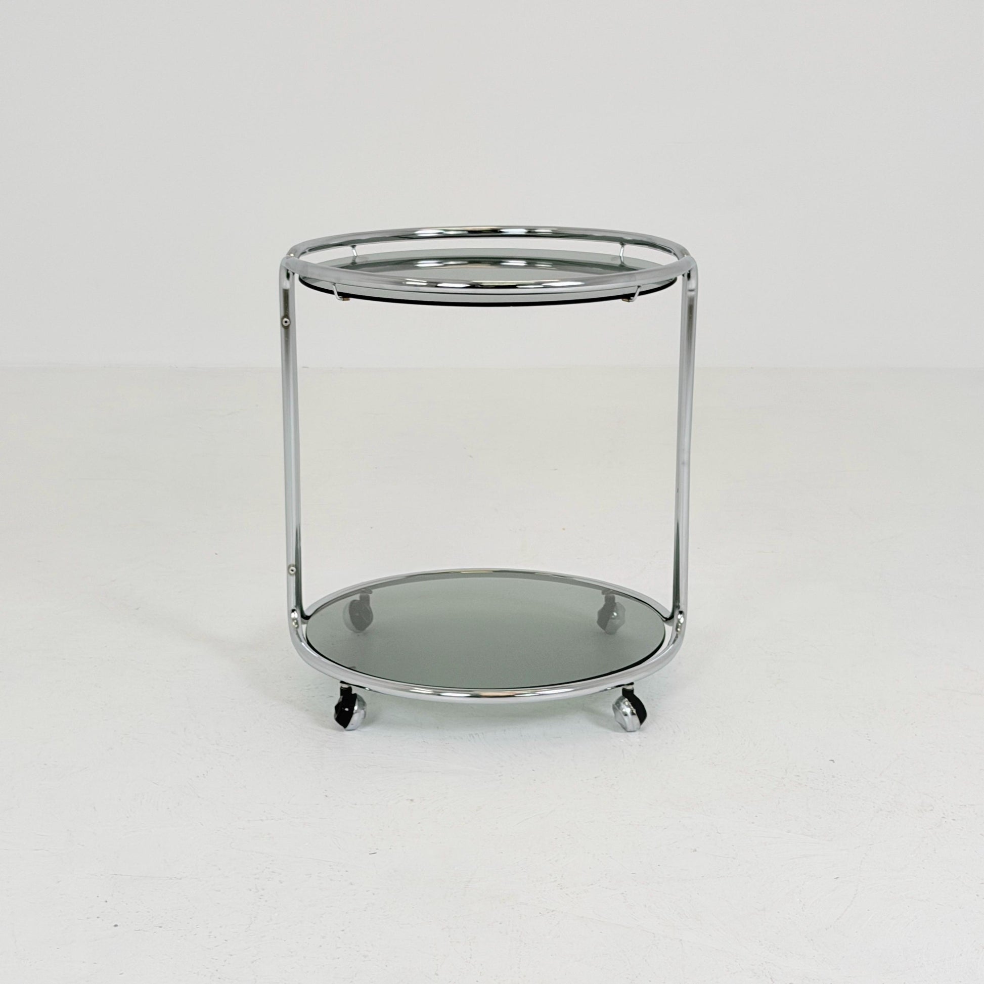 Mid century Chrome bar cart/serving trolley. Smoked glass Bauhaus Italy 1980s