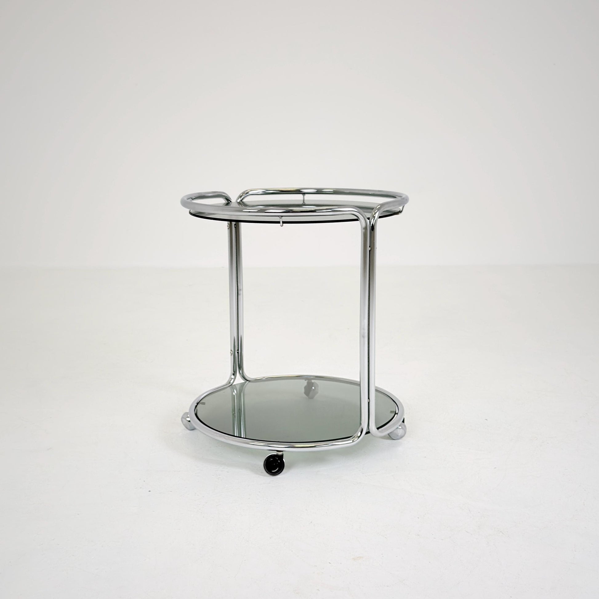 Mid century Chrome bar cart/serving trolley. Smoked glass Bauhaus Italy 1980s