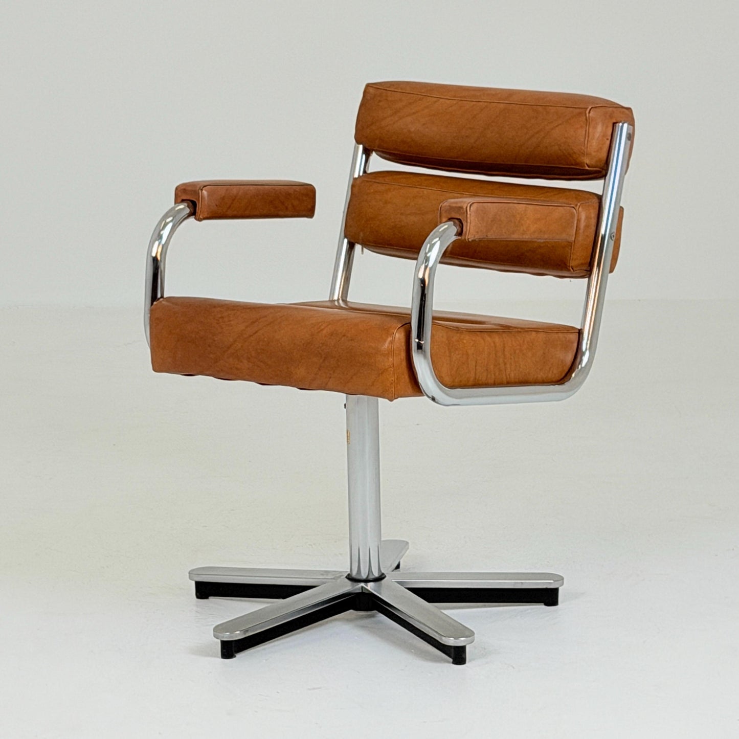 Mid-Century Bauhaus Executive Swivel Armchair | Cognac Leather & Chrome Star Base | Italy 1980s