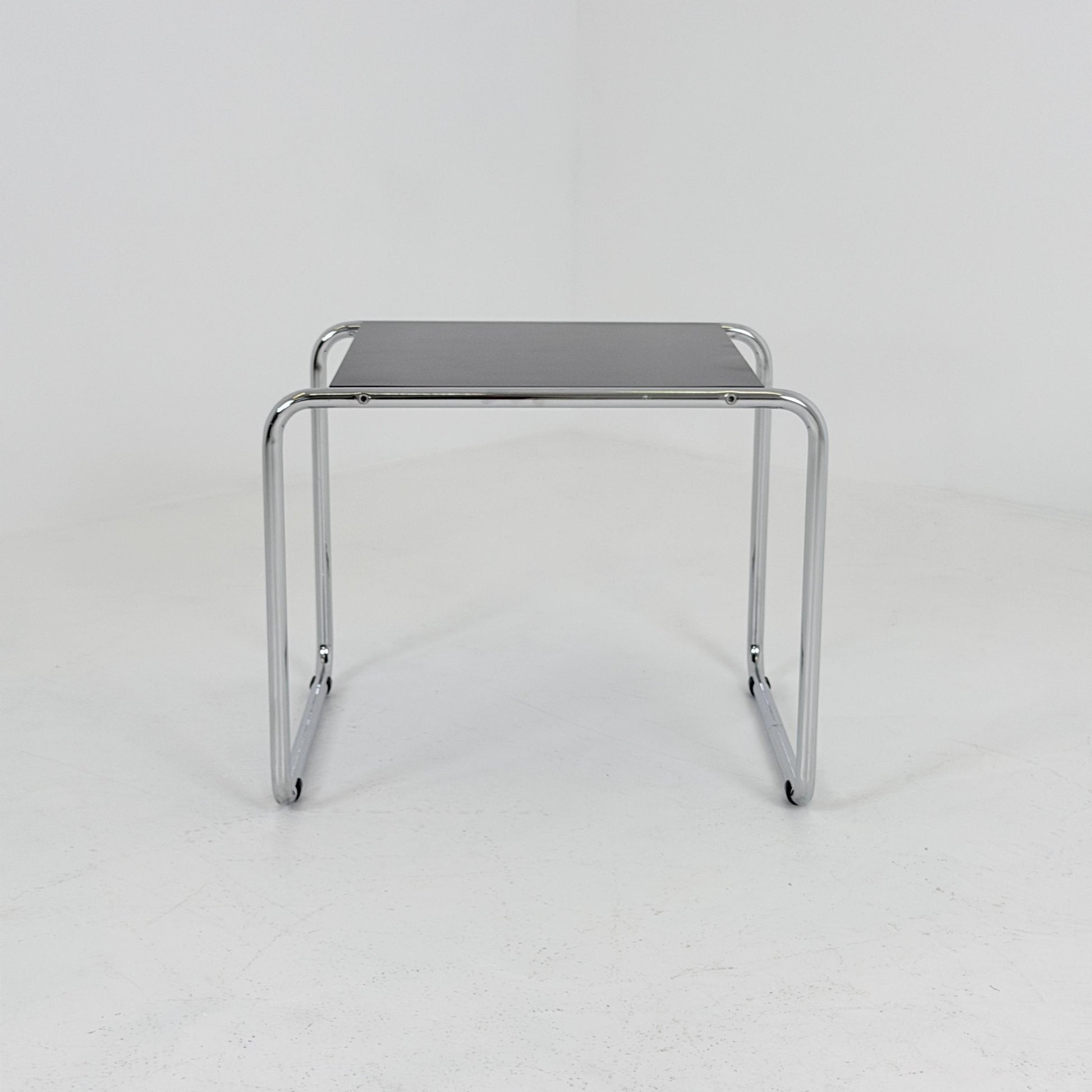 Mid century Bauhaus Marcel Breuer - Laccio Side coffee Table black Laminated Top with Tubular Chromed Base 1980s Itlay