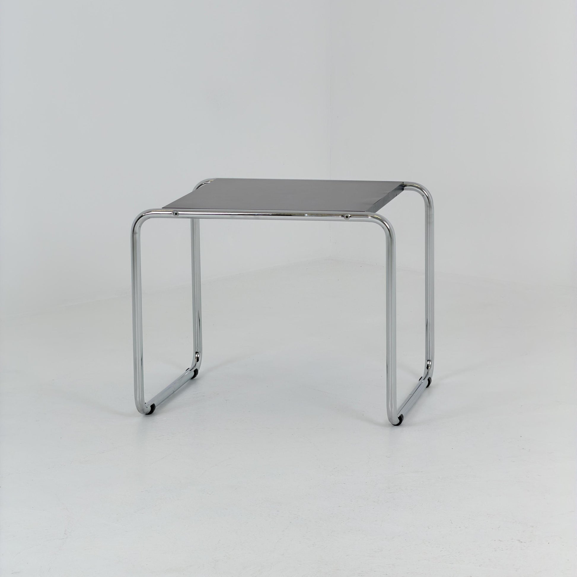 Mid century Bauhaus Marcel Breuer - Laccio Side coffee Table black Laminated Top with Tubular Chromed Base 1980s Itlay