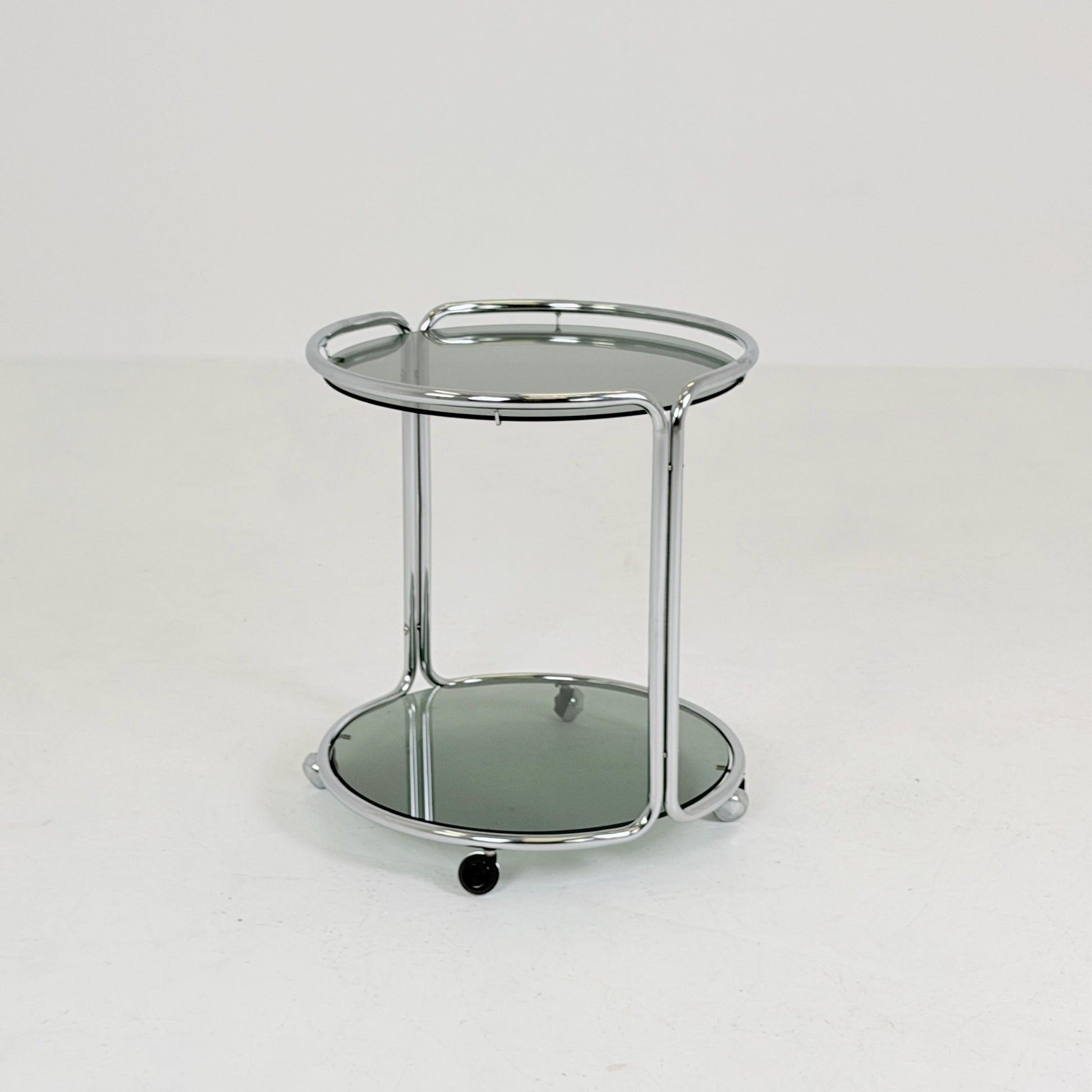 Mid century Chrome bar cart/serving trolley. Smoked glass Bauhaus Italy 1980s