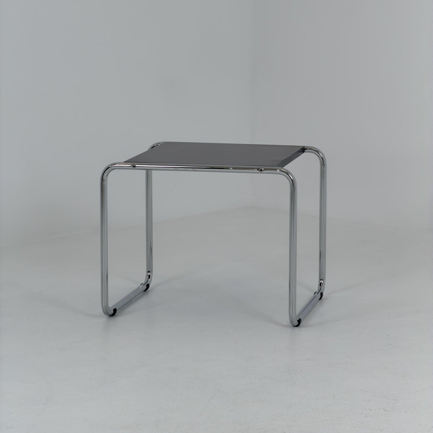 Mid century Bauhaus Marcel Breuer - Laccio Side coffee Table black Laminated Top with Tubular Chromed Base 1980s Itlay