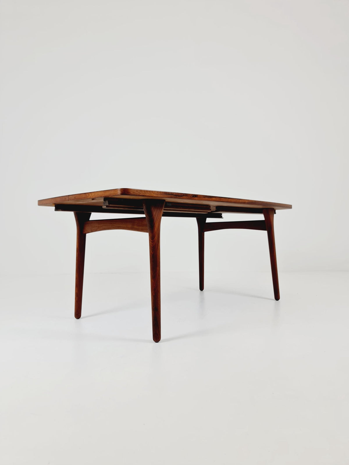 Danish Henning Kjaernulf Rosewood table with two extension leaves, Denmark 1960s