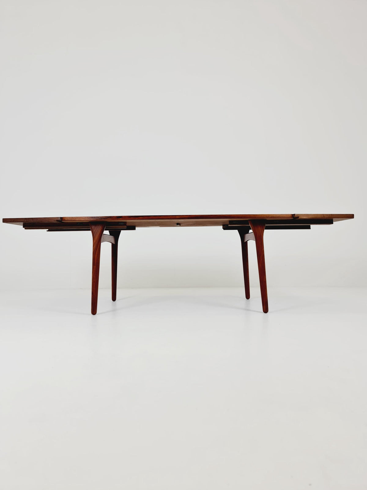 Danish Henning Kjaernulf Rosewood table with two extension leaves, Denmark 1960s