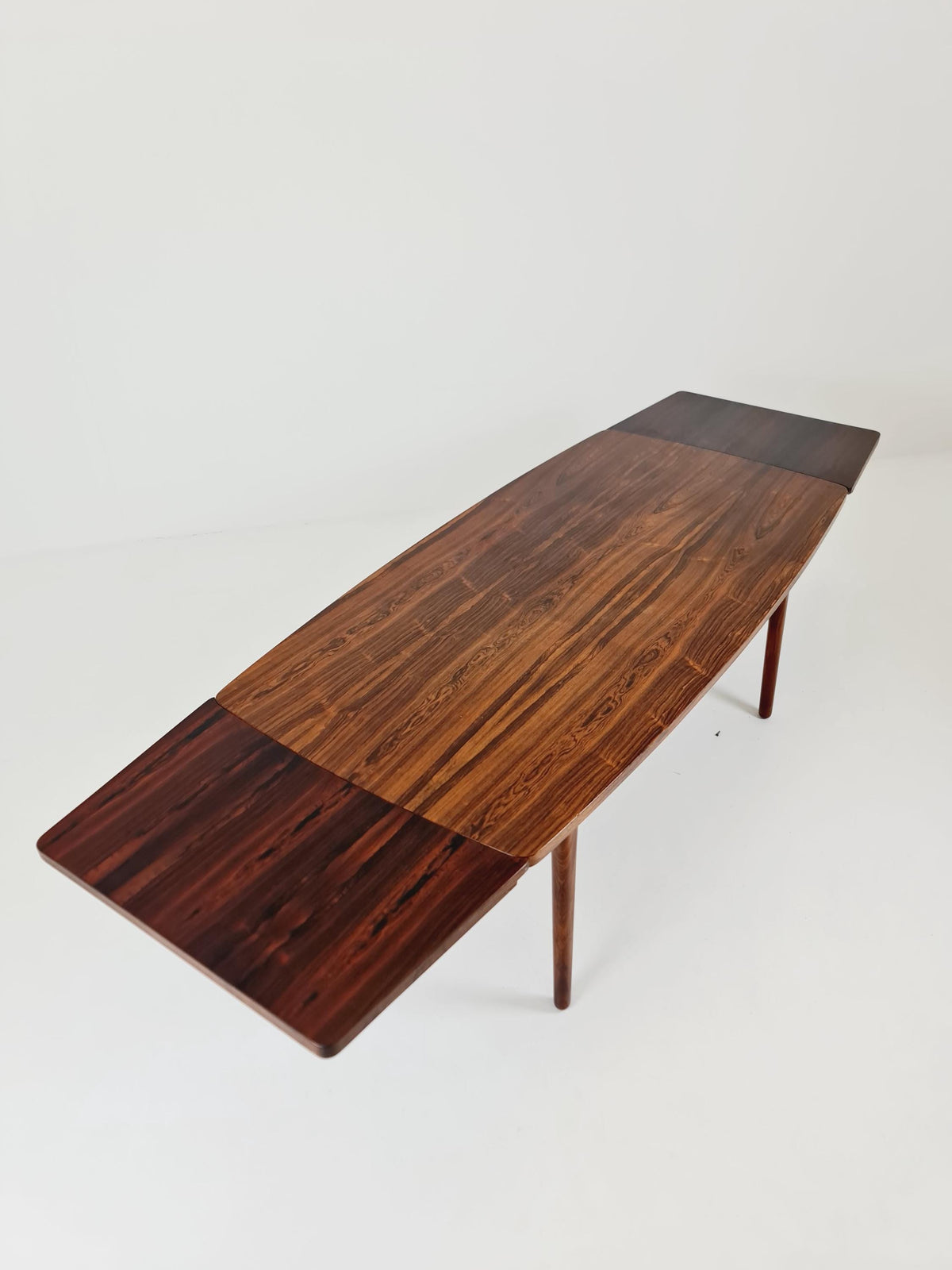 Danish Henning Kjaernulf Rosewood table with two extension leaves, Denmark 1960s