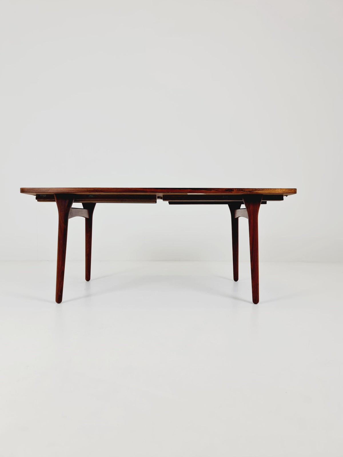 Danish Henning Kjaernulf Rosewood table with two extension leaves, Denmark 1960s