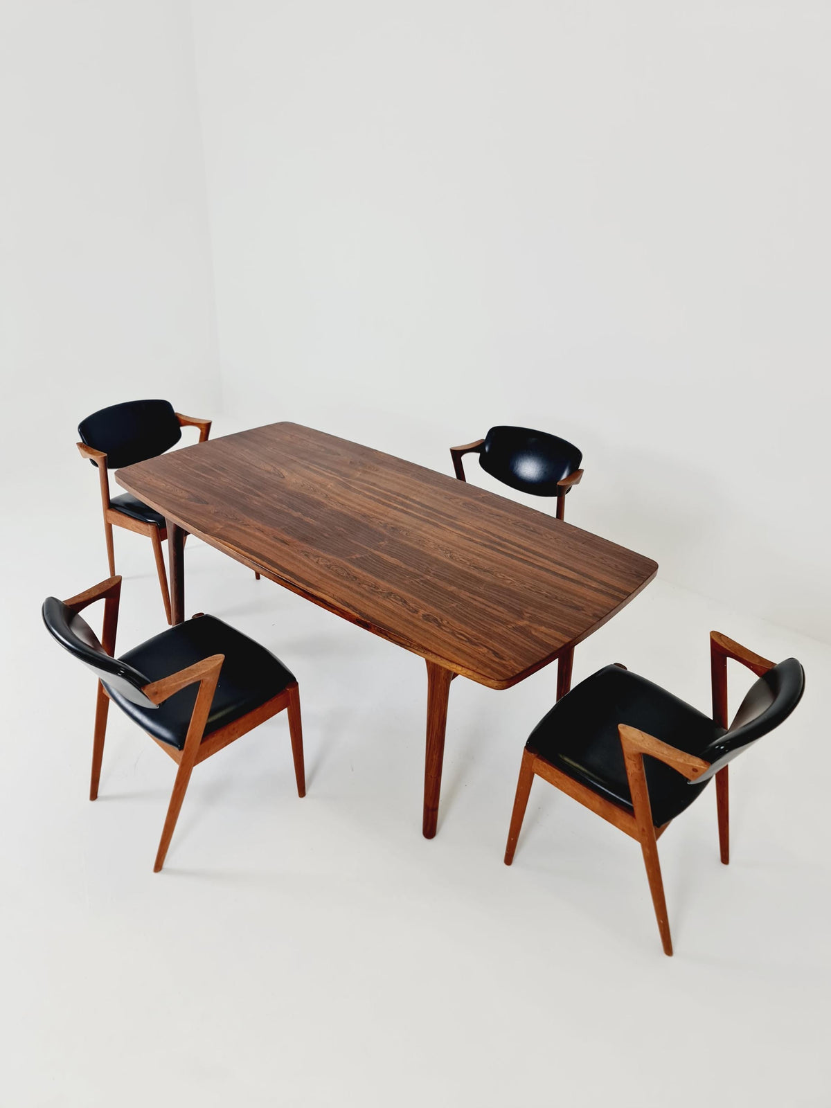 Danish Henning Kjaernulf Rosewood table with two extension leaves, Denmark 1960s