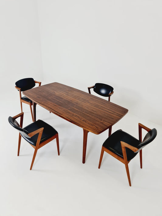 Danish Henning Kjaernulf Rosewood table with two extension leaves, Denmark 1960s
