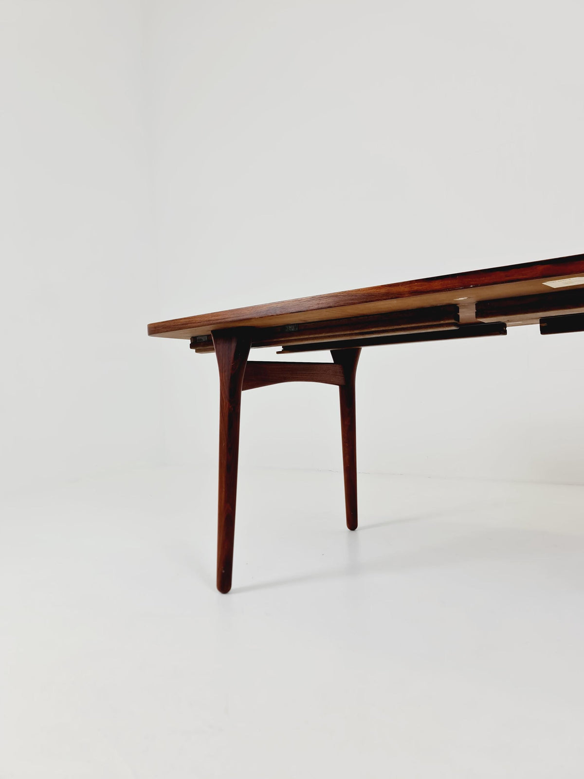 Danish Henning Kjaernulf Rosewood table with two extension leaves, Denmark 1960s