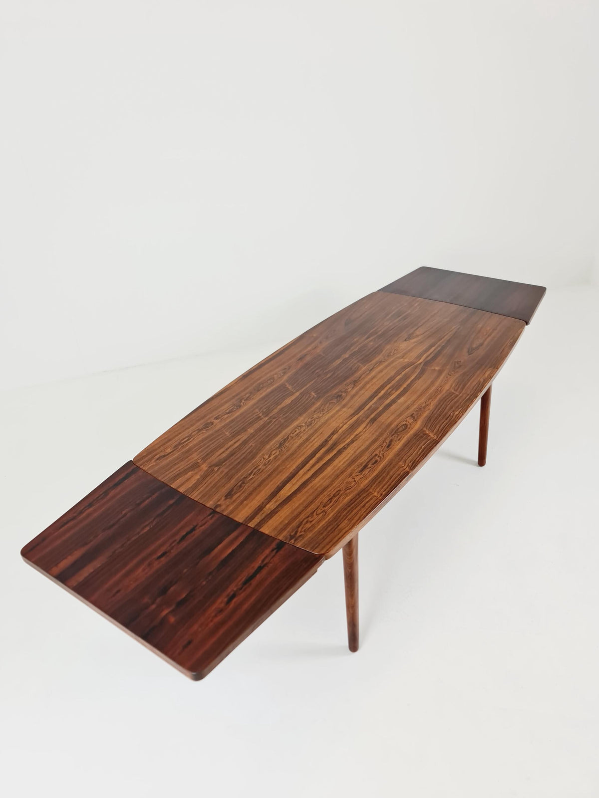 Danish Henning Kjaernulf Rosewood table with two extension leaves, Denmark 1960s