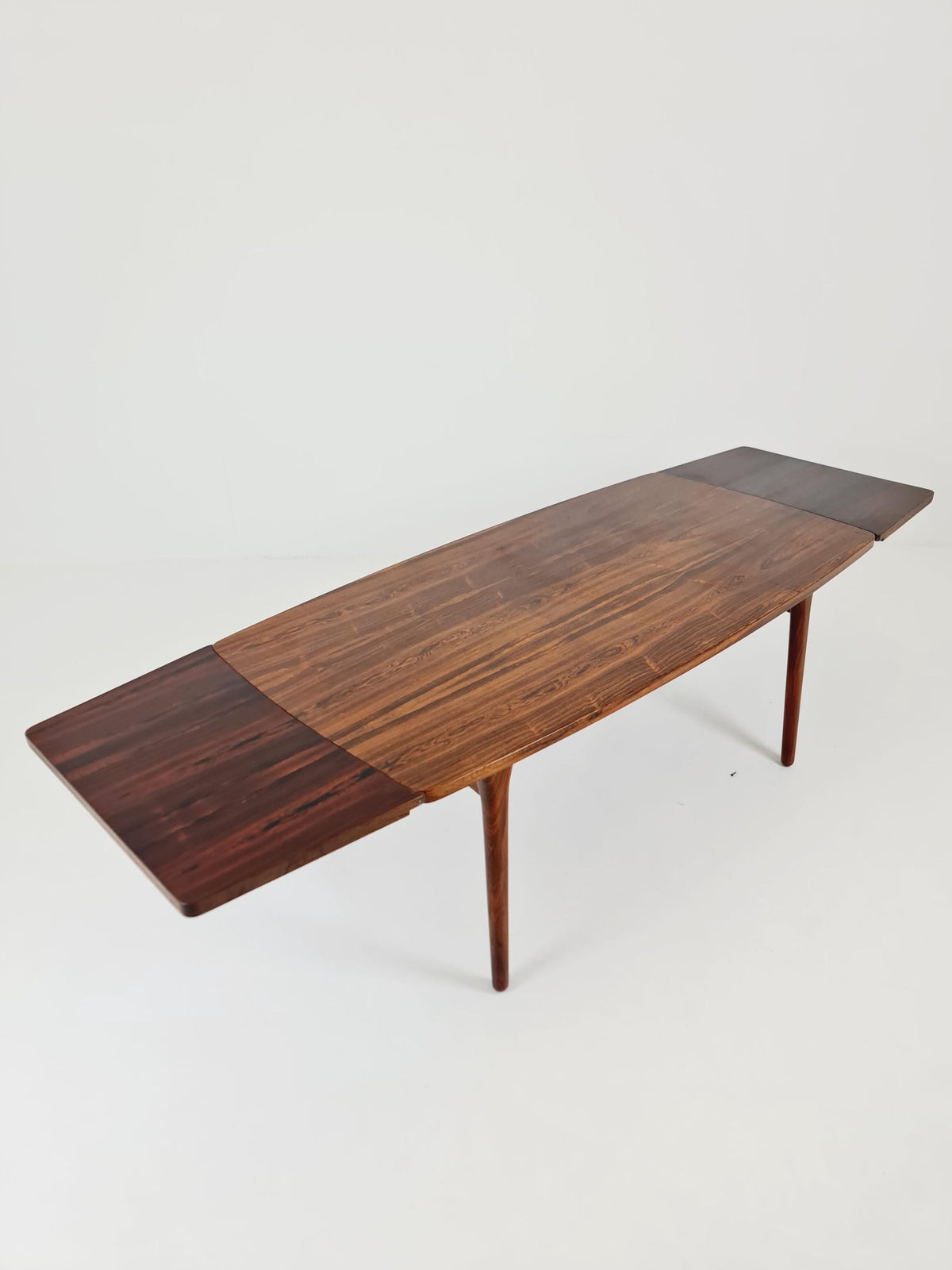 Danish Henning Kjaernulf Rosewood table with two extension leaves, Denmark 1960s