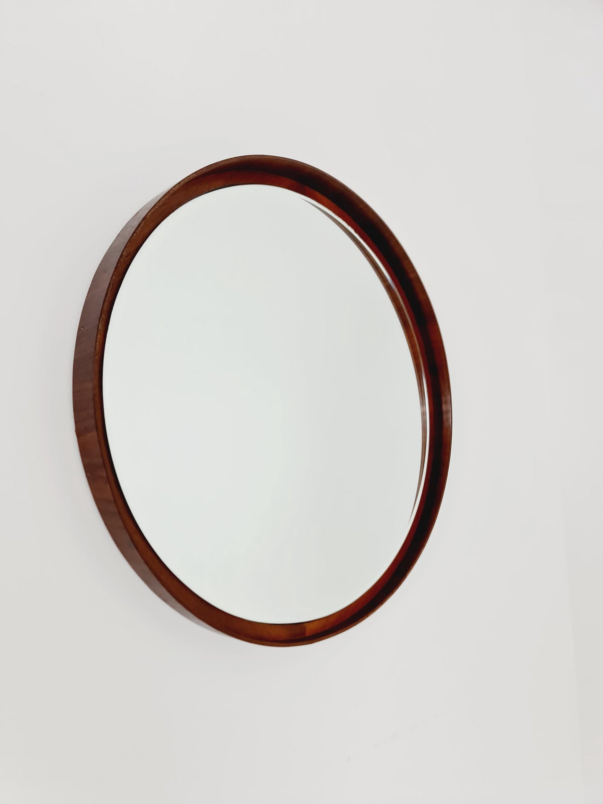 Mid Century round teak wall mirror from the 60s