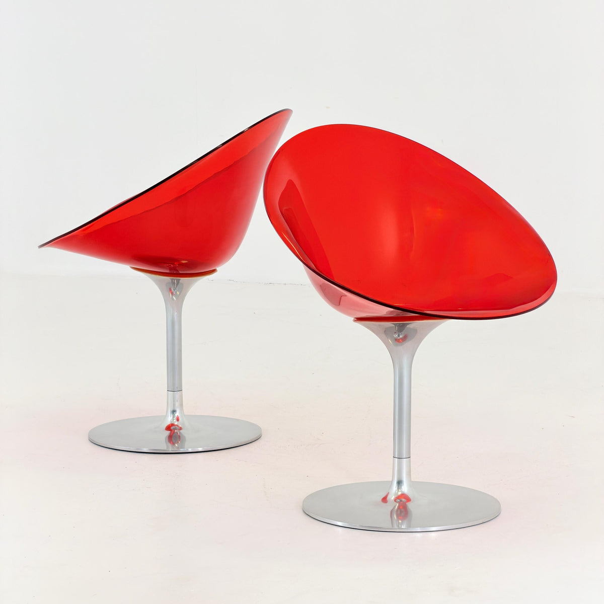1 of 2 Mid Century Philippe Starck Eros Lounge Chair for Kartell, Red Plexiglass Swivel Armchair, 1990s Italy