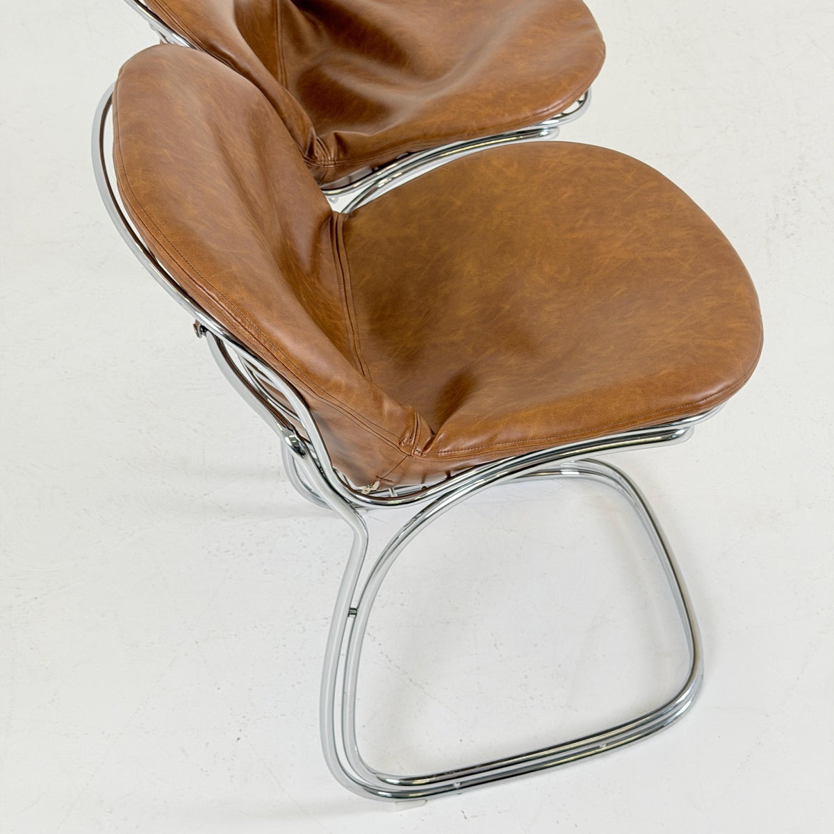 1 of 2 Mid century Bauhaus cognac leather Sabrina dining chair by Gaston’s Rinaldi for Rima Linea ,1970s Italy