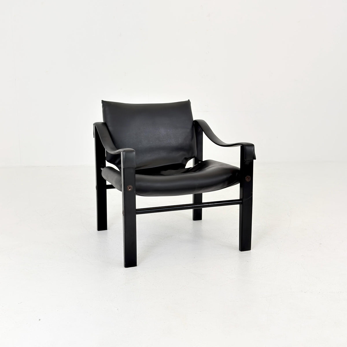 Mid century black edition leather Safari armchairs from Arkana by Maurice Burke, United Kingdom 1970s England