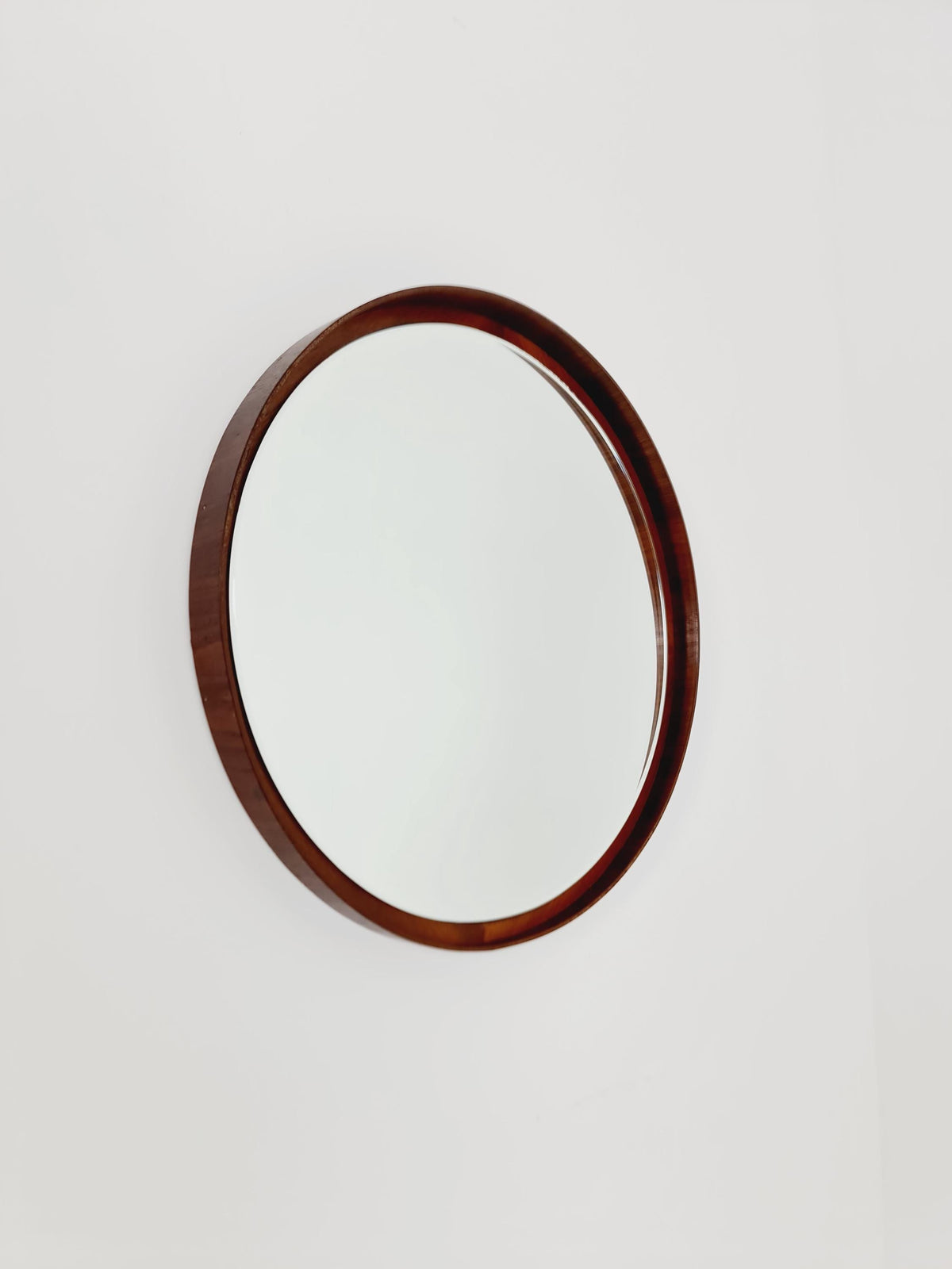 Mid Century round teak wall mirror from the 60s