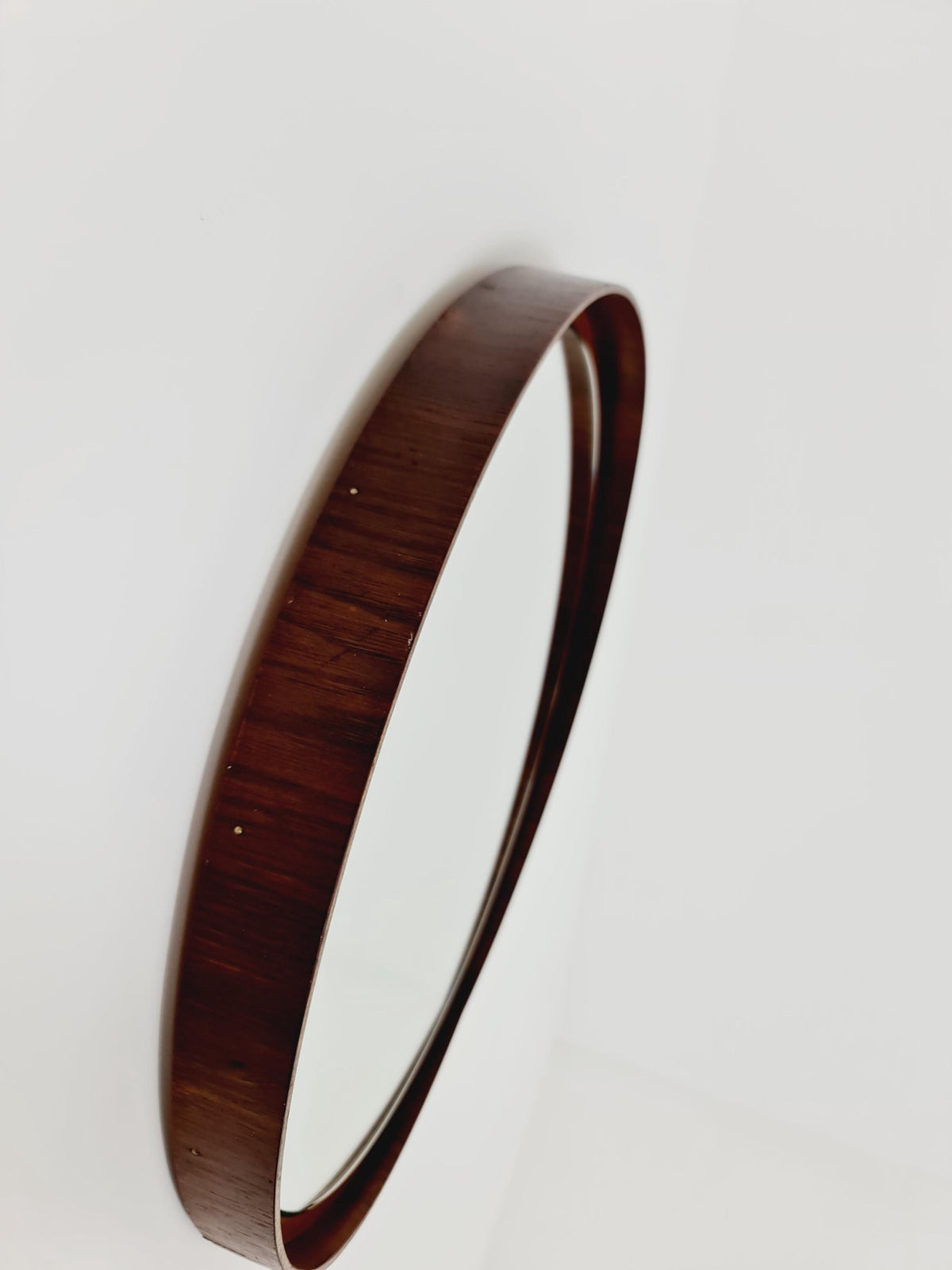 Mid Century round teak wall mirror from the 60s