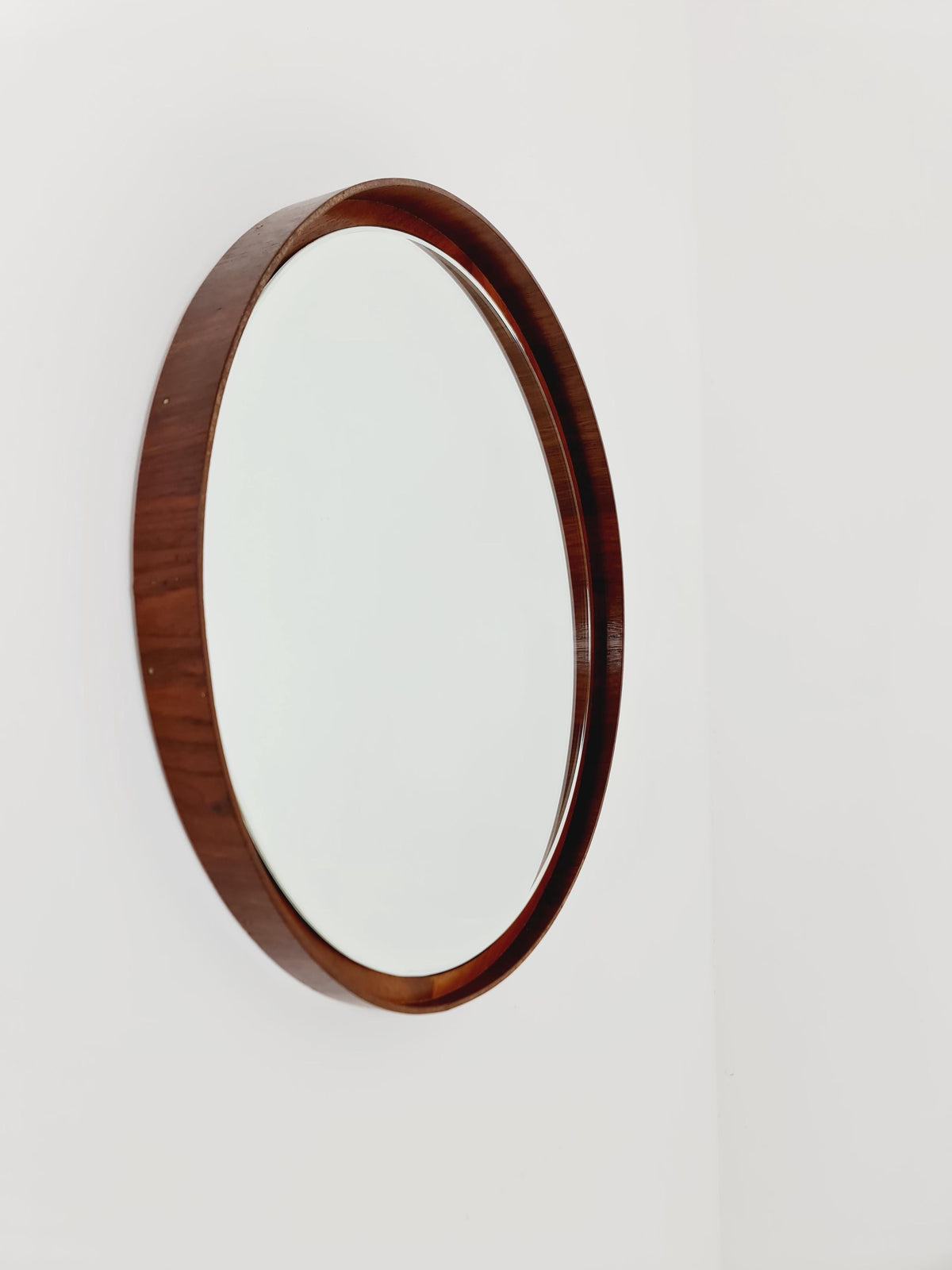 Mid Century round teak wall mirror from the 60s
