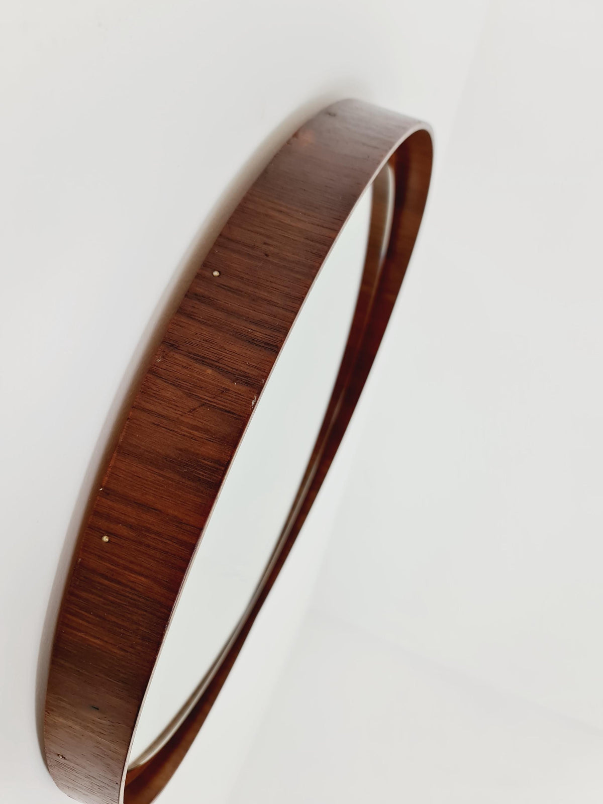 Mid Century round teak wall mirror from the 60s