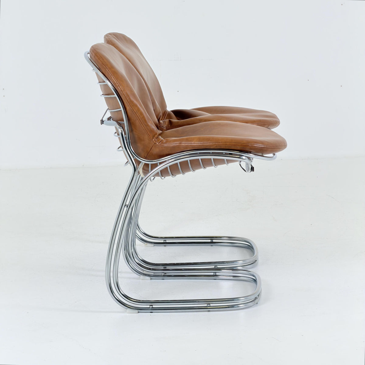 1 of 2 Mid century Bauhaus cognac leather Sabrina dining chair by Gaston’s Rinaldi for Rima Linea ,1970s Italy