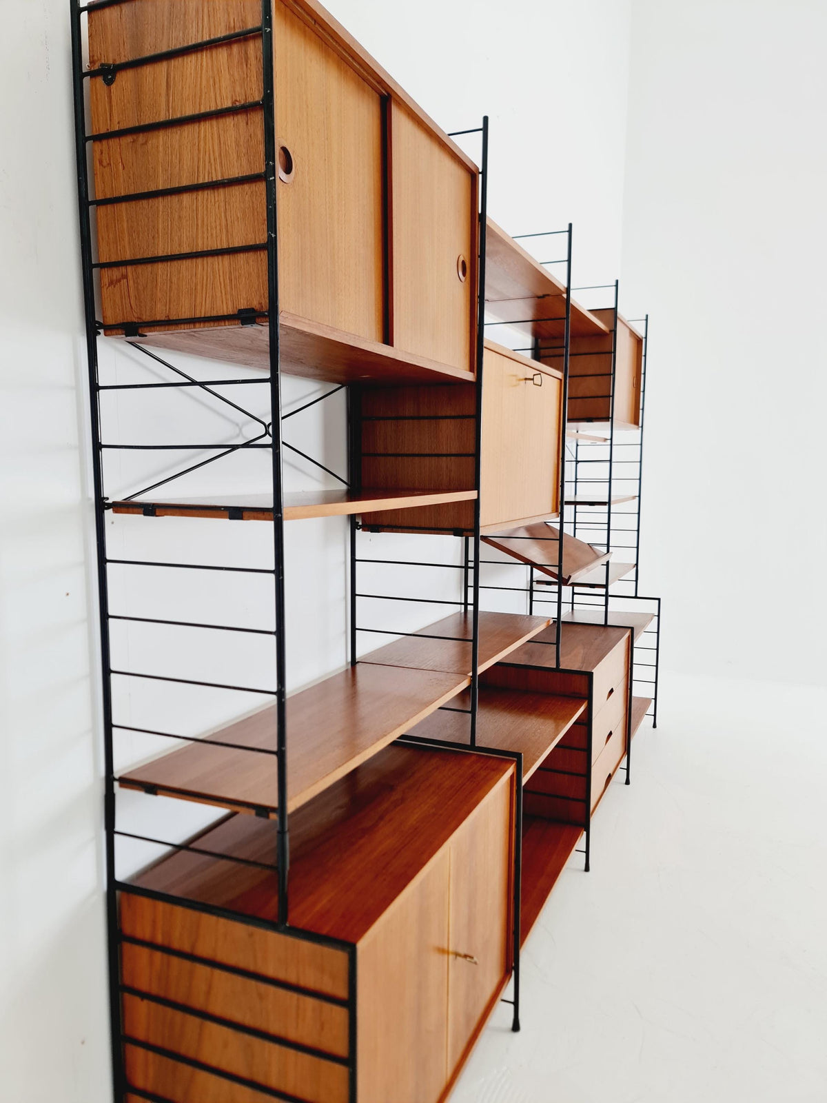 Mid century String shelf-system, bookcase with 3 cabinet and show case walnut wood by WHB Germany, 1950s